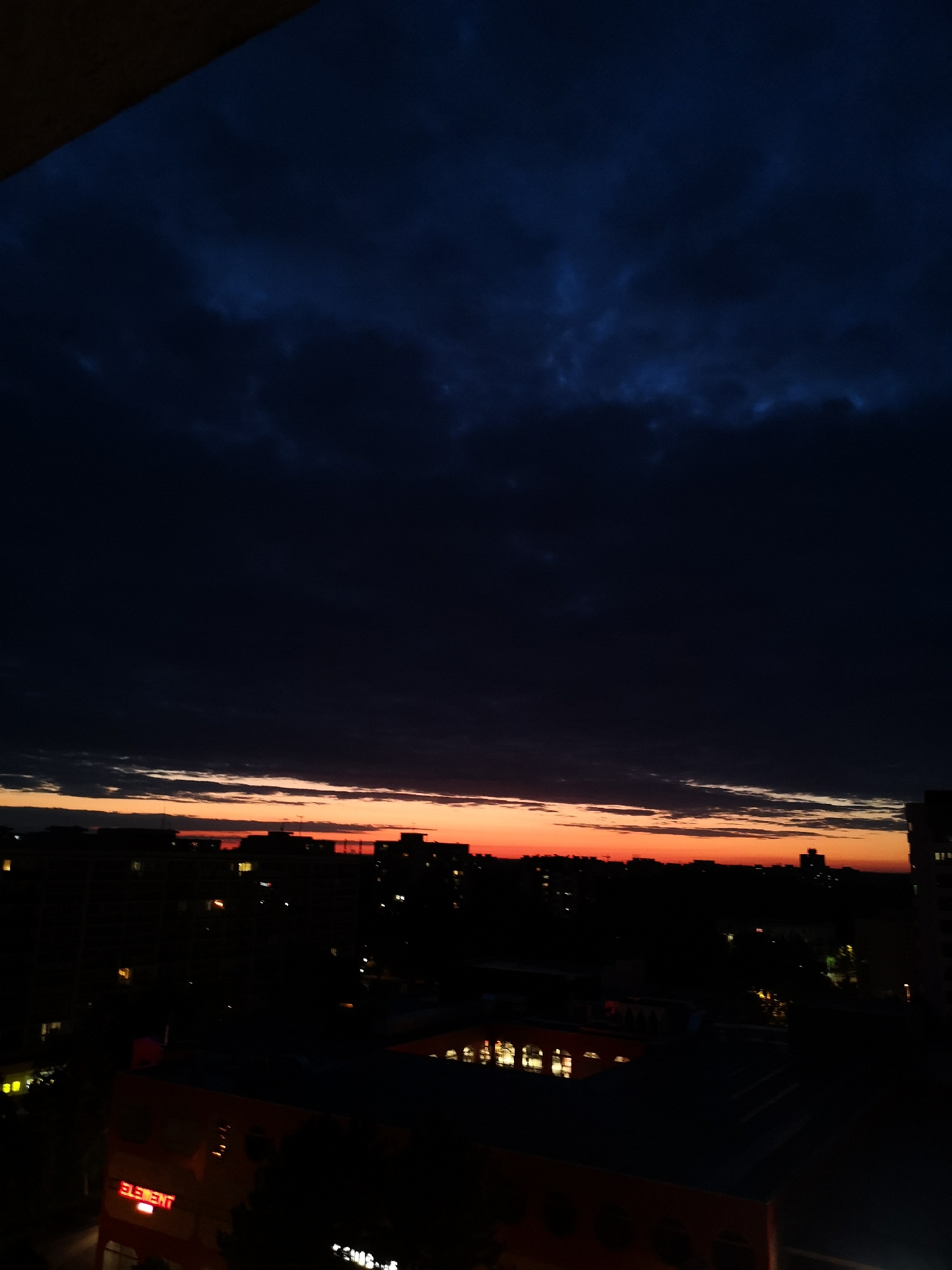 Twilight cityscape captured with colorful sky at dusk