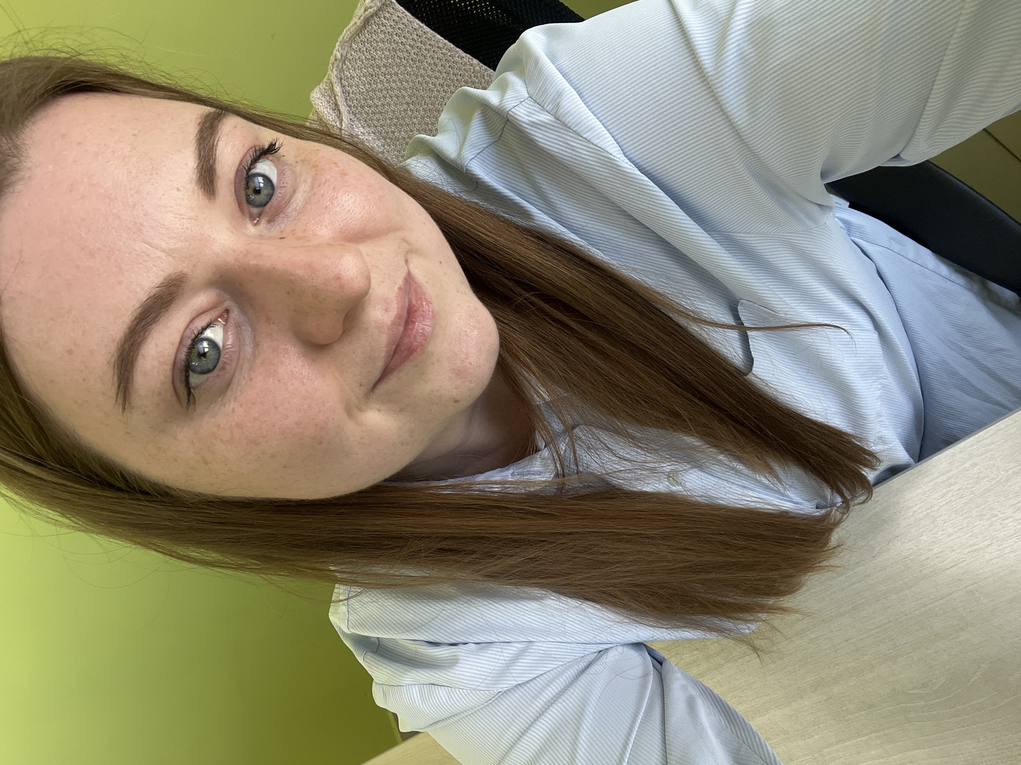 Office selfies and construction equipment activity in Klin, Russia