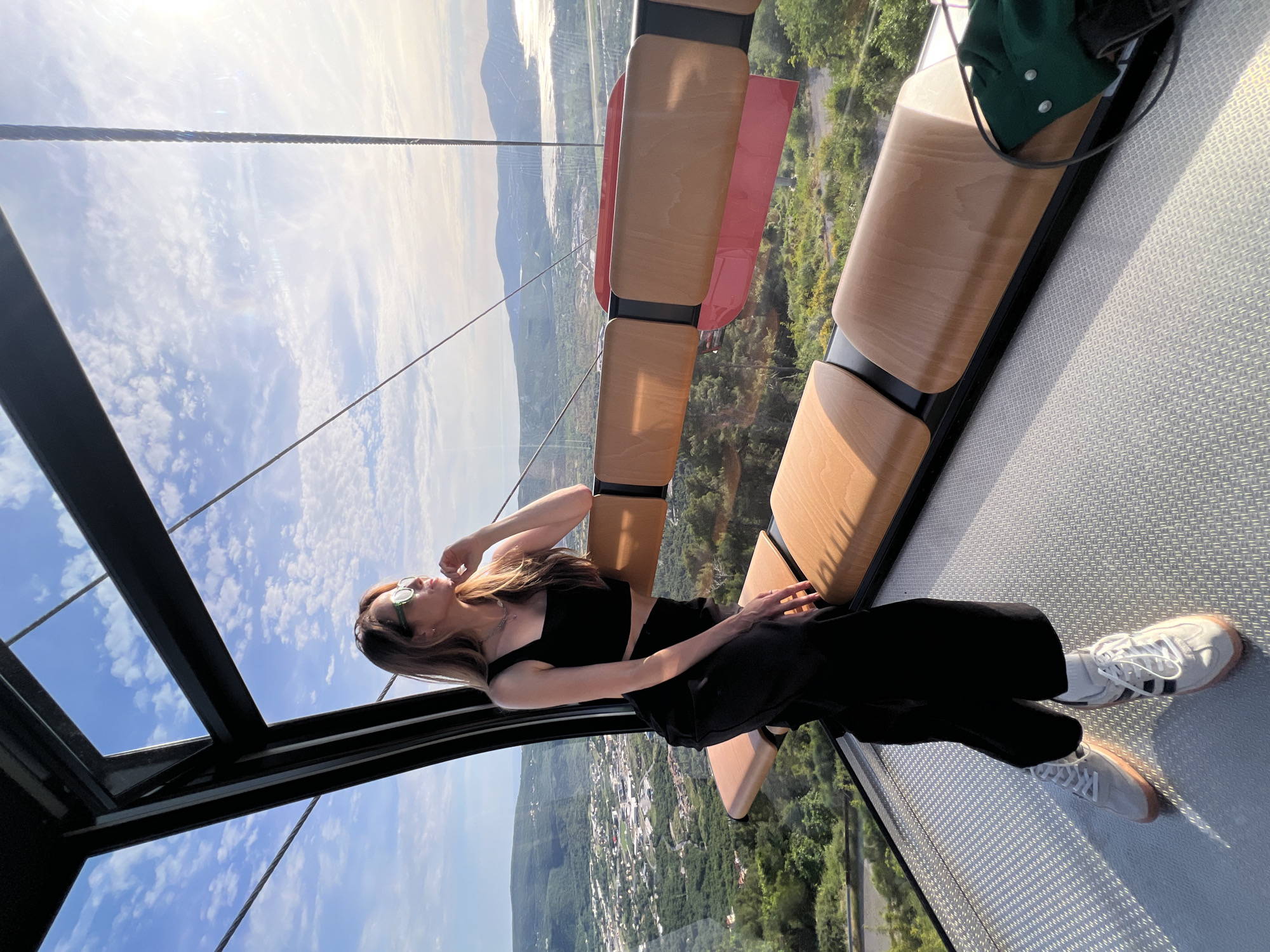Woman enjoys scenic cable car ride through Montenegro countryside