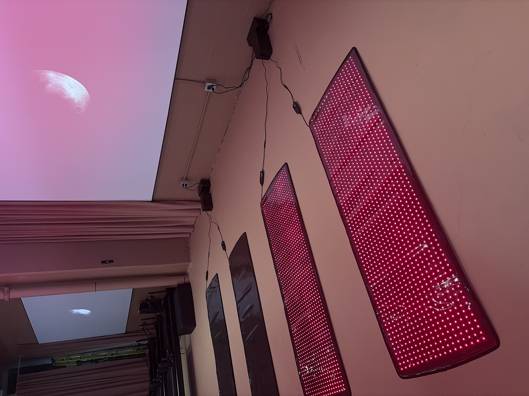 Red light therapy panels illuminate Montreal interior space