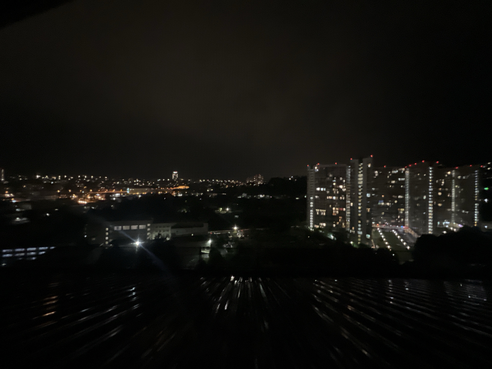 Rooftop views and graffiti stairwells in nighttime Sochi