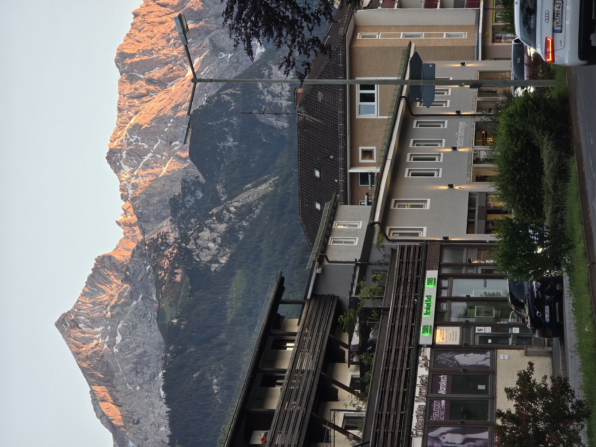 Golden hour views of Zugspitze and Bavarian streets