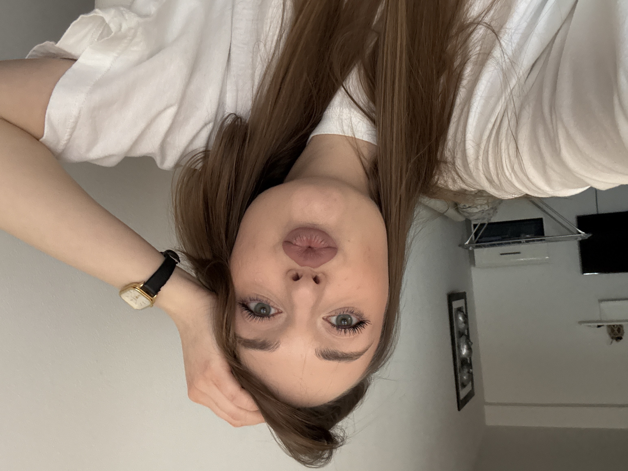 Woman takes selfies indoors in Kragujevac, Serbia