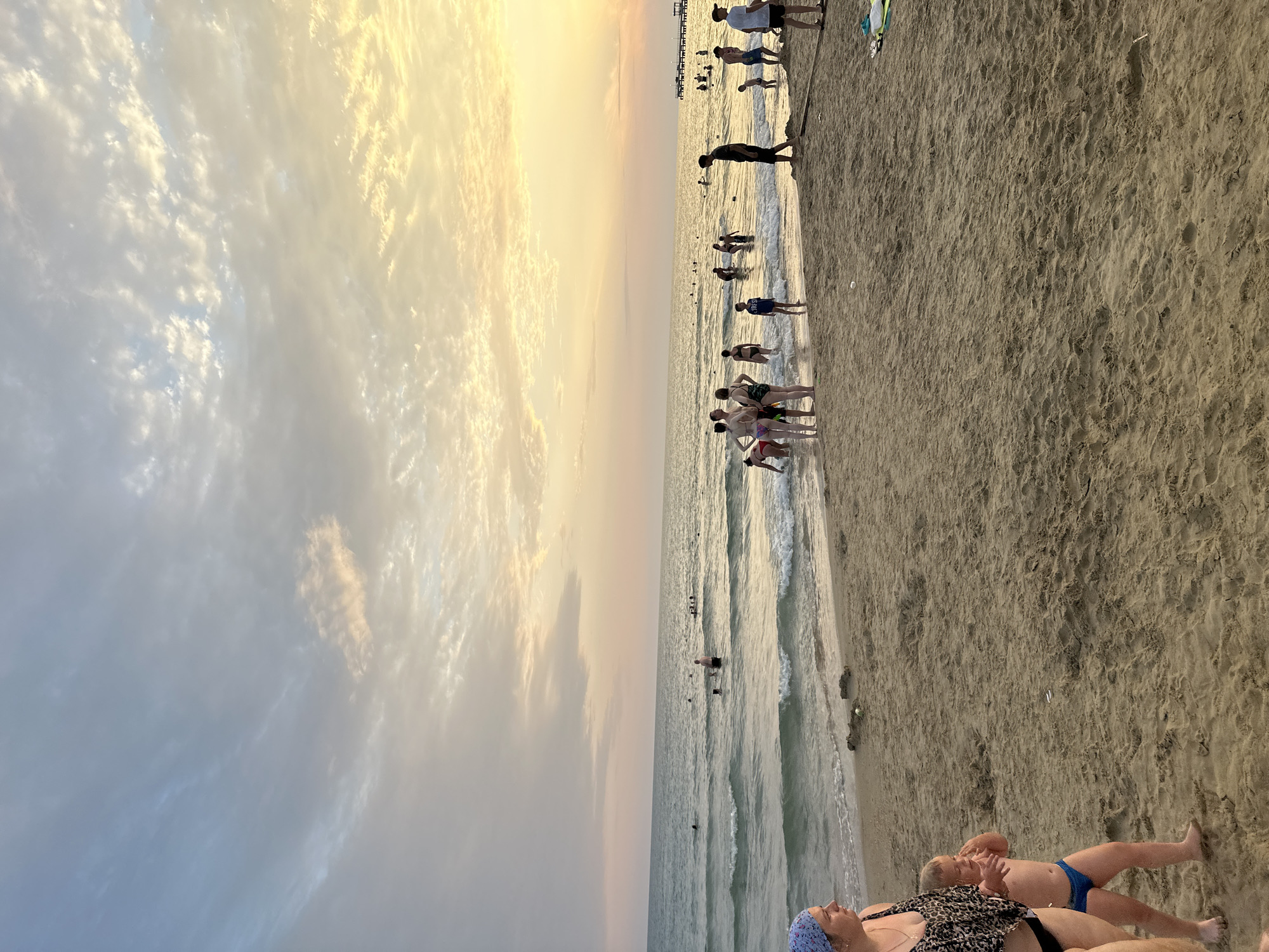 Sunset over a crowded Black Sea beach in Anapa