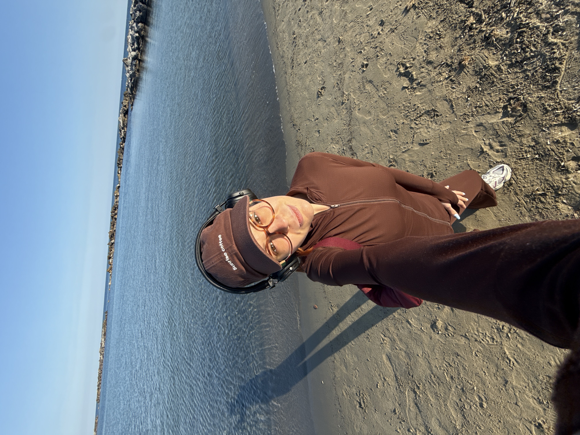 Visitor documents leisurely beach afternoon in Sanremo, Italy