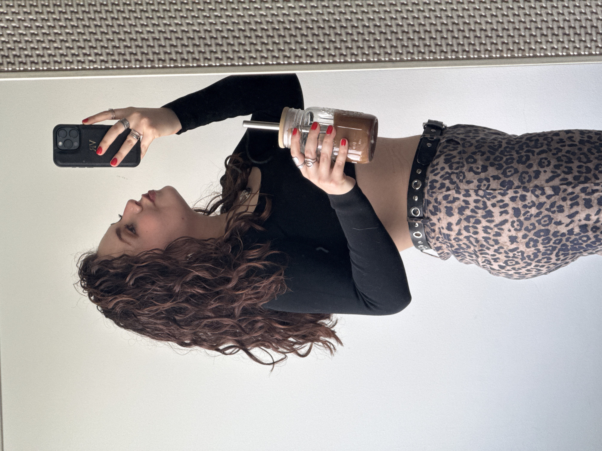 Woman documents evening selfie session in Mexico City apartment