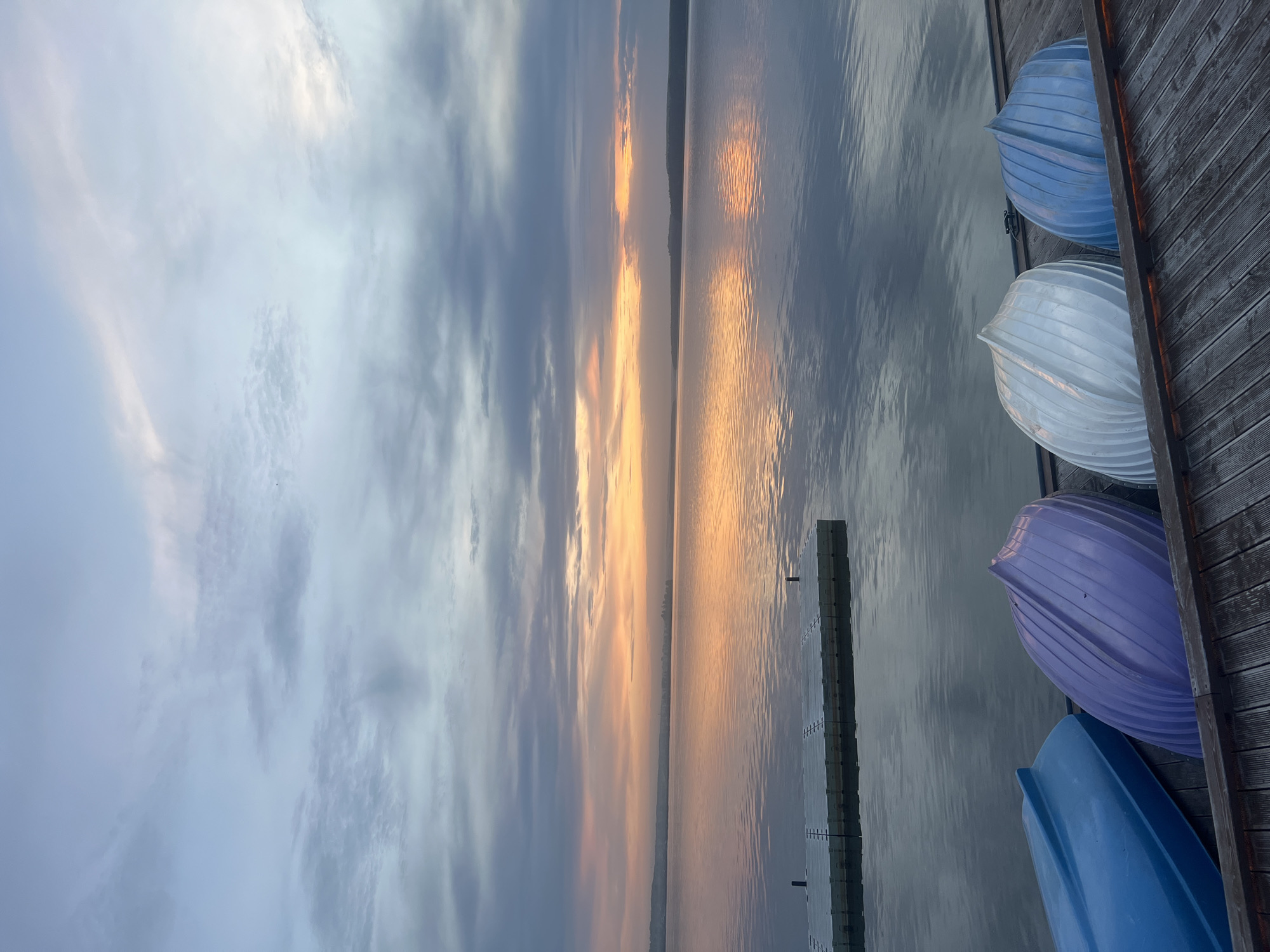 Evening waterfront gathering documented in Votkinsk, Russia