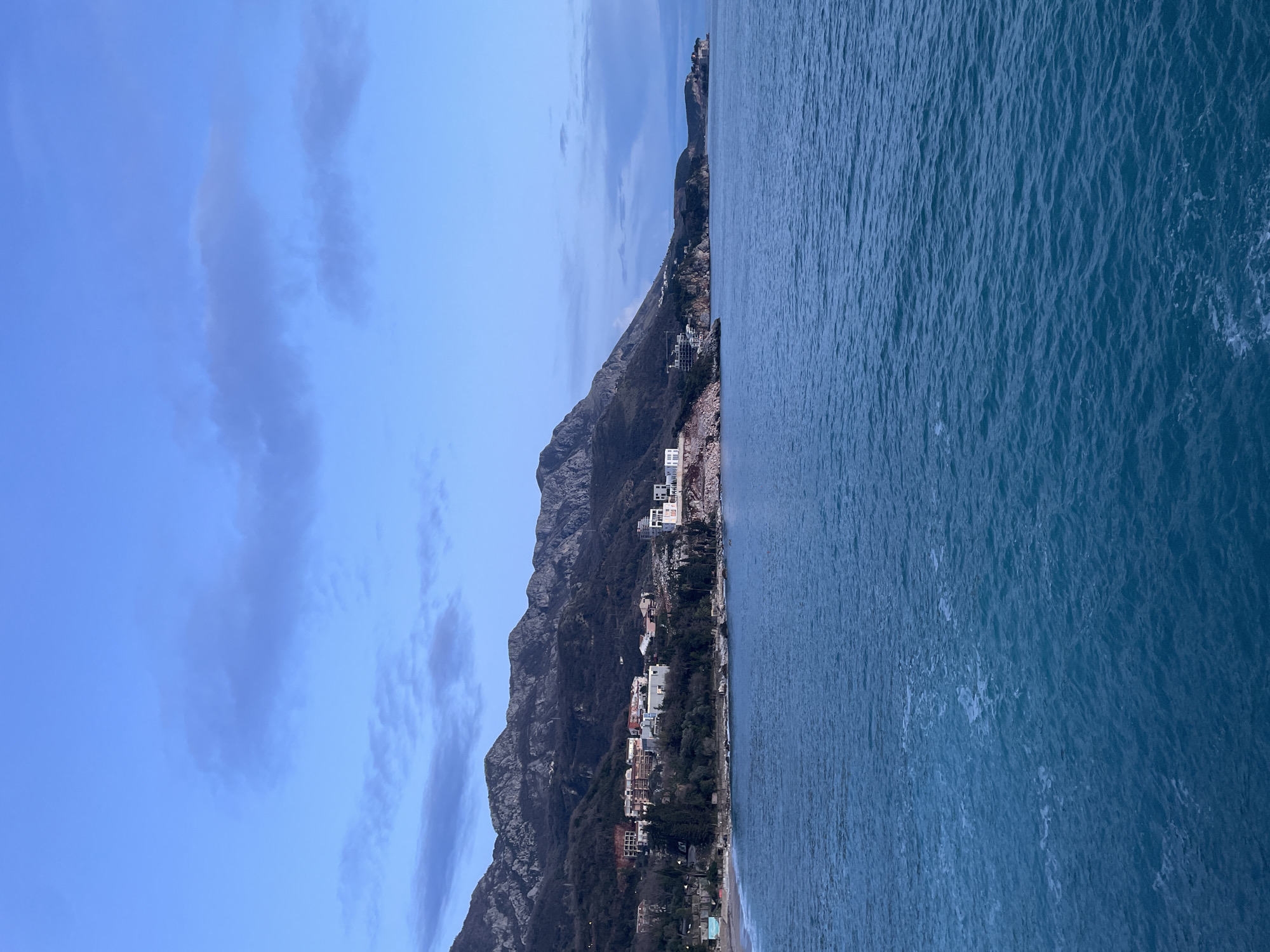 Twilight coastal documentation along Montenegro's Adriatic cliffs and tunnels