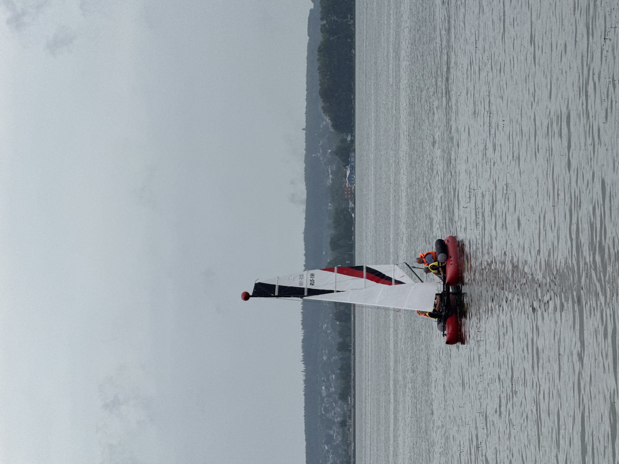 Sailing event on the Votkinsk Reservoir, overcast June morning