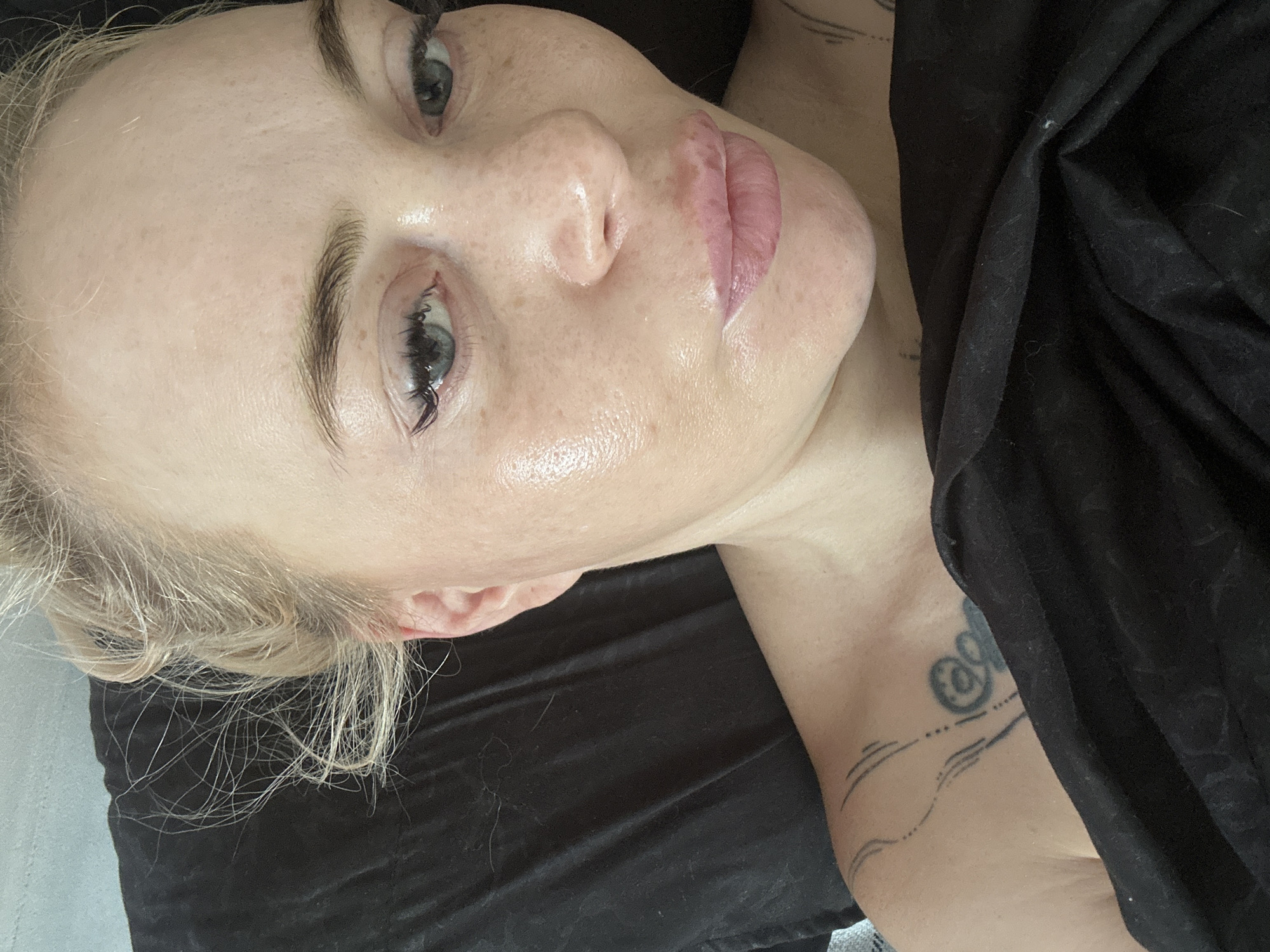Woman photographed in intimate close-up portraits while resting