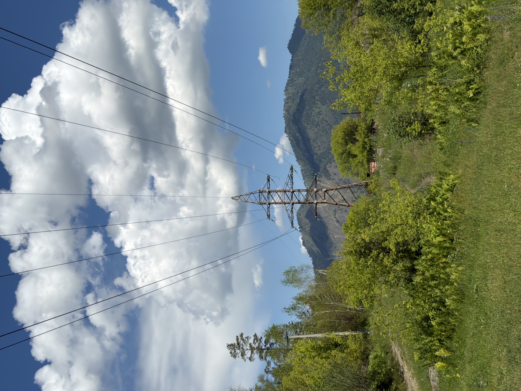Rural Siberian countryside: pylons, a stream crossing, and big skies