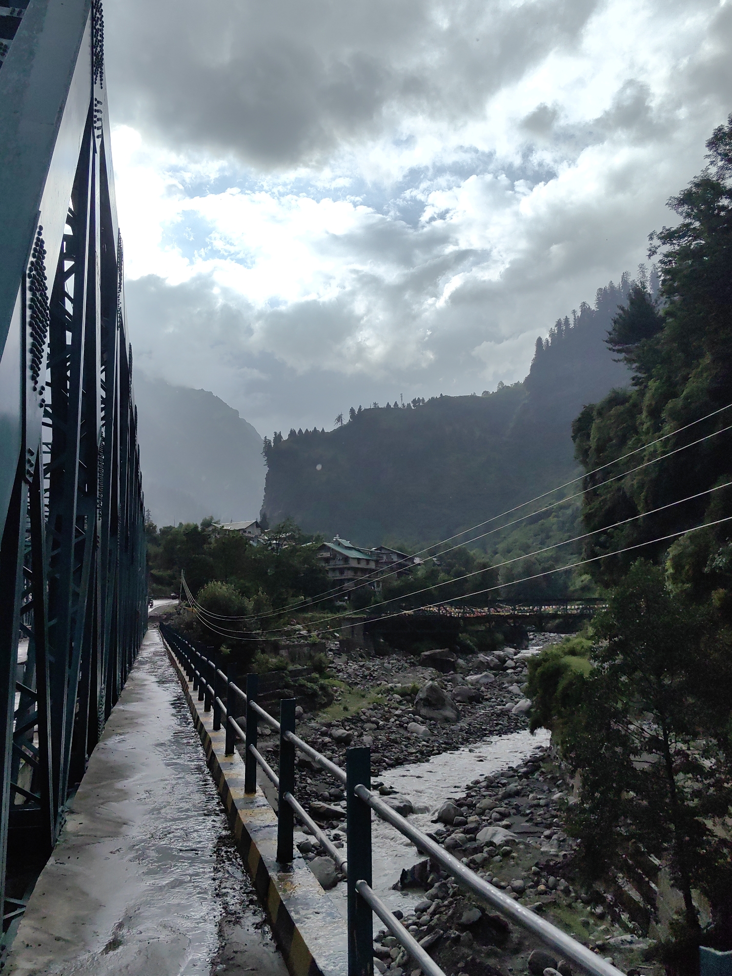 Solang Nala running high and murky after rain
