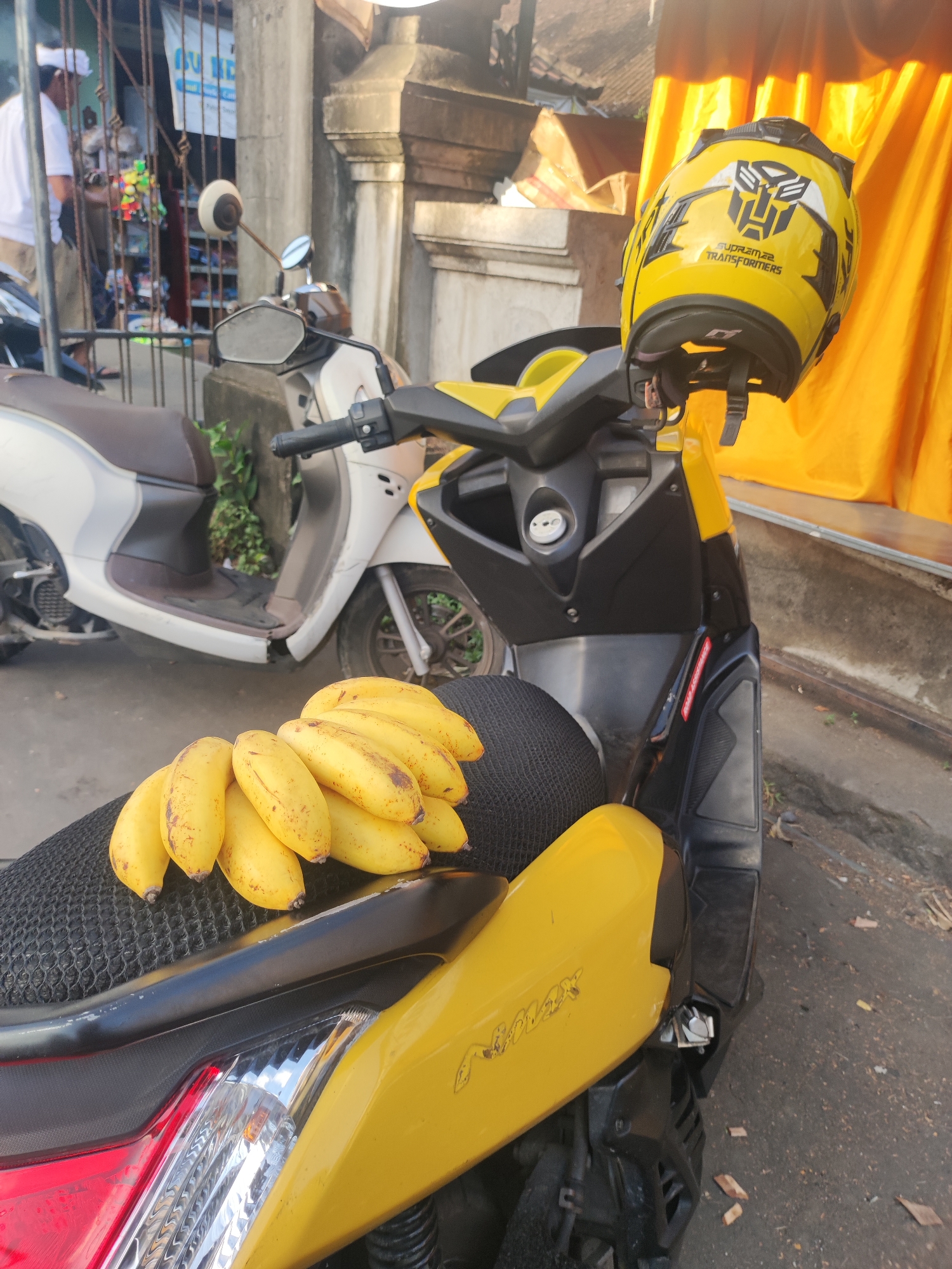 Scooter with bananas and Transformers helmet spotted in Ubud