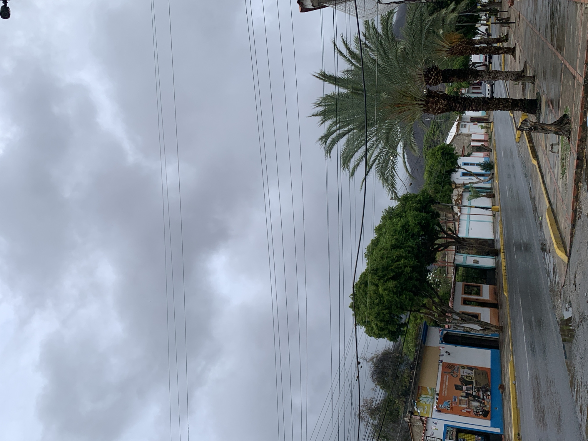 Post-rain evening scenes captured across Santa Ana, Venezuela neighborhoods