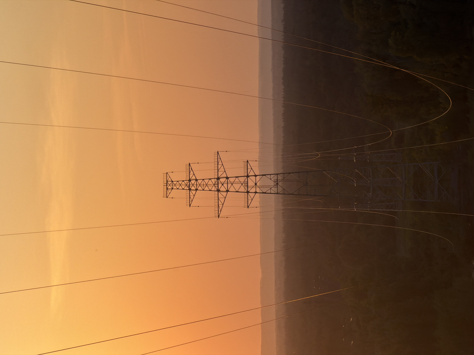 Sunset documented over power infrastructure in Chaykovsky, Russia