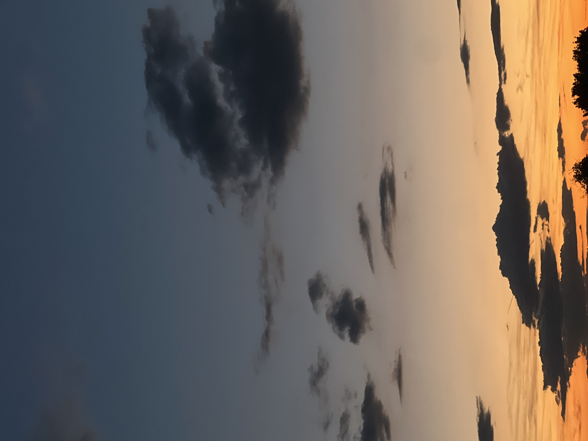 Dramatic sunset with dark clouds over Plovdiv, Bulgaria