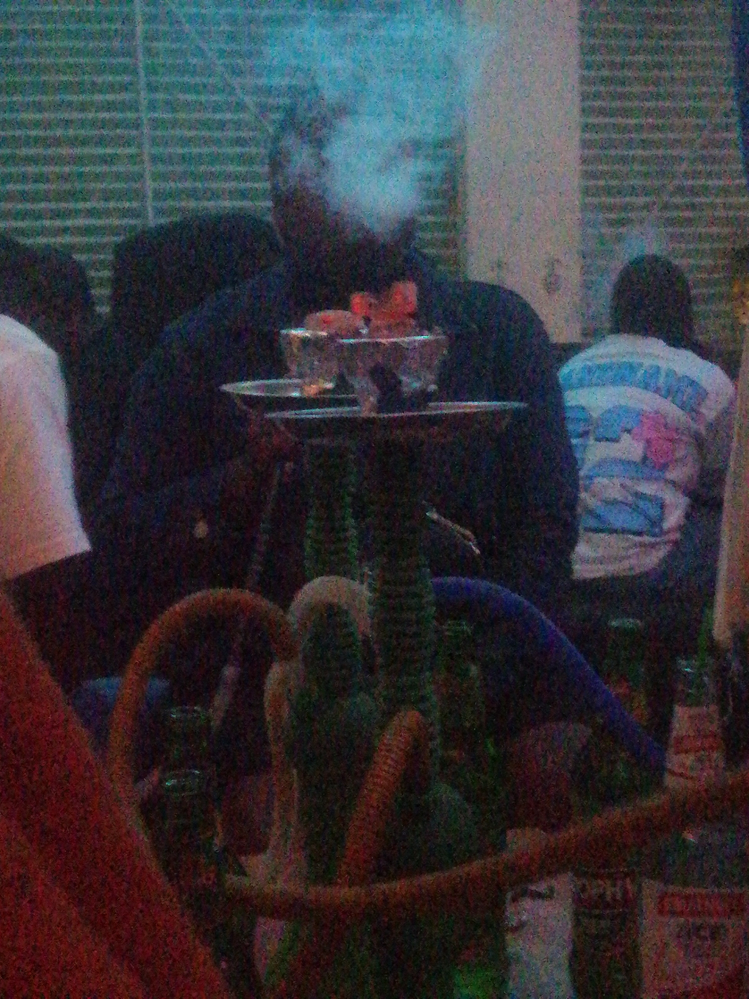 Evening social gathering documented at Jos lounge