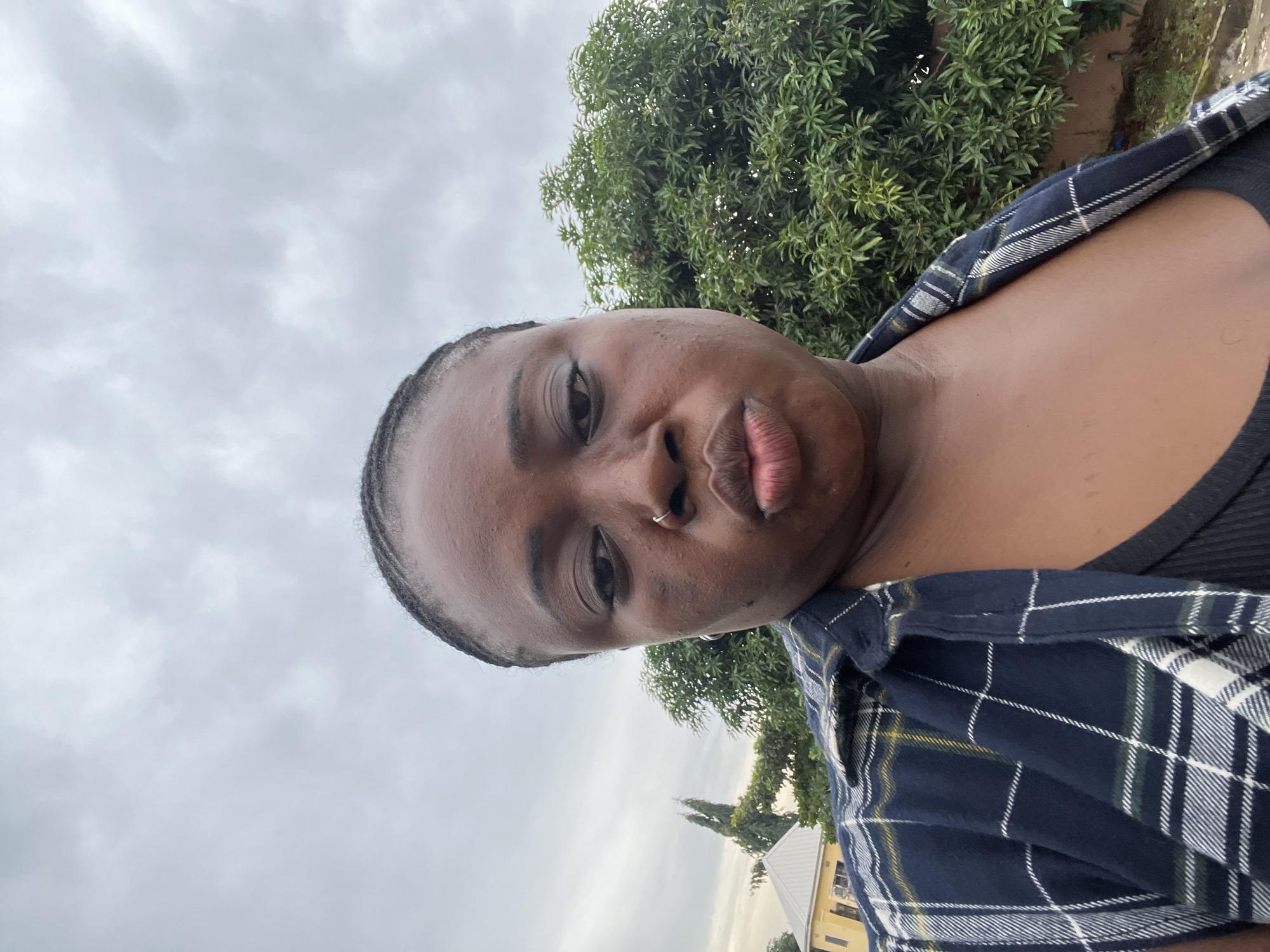 Quick selfie session in an Abuja residential neighborhood