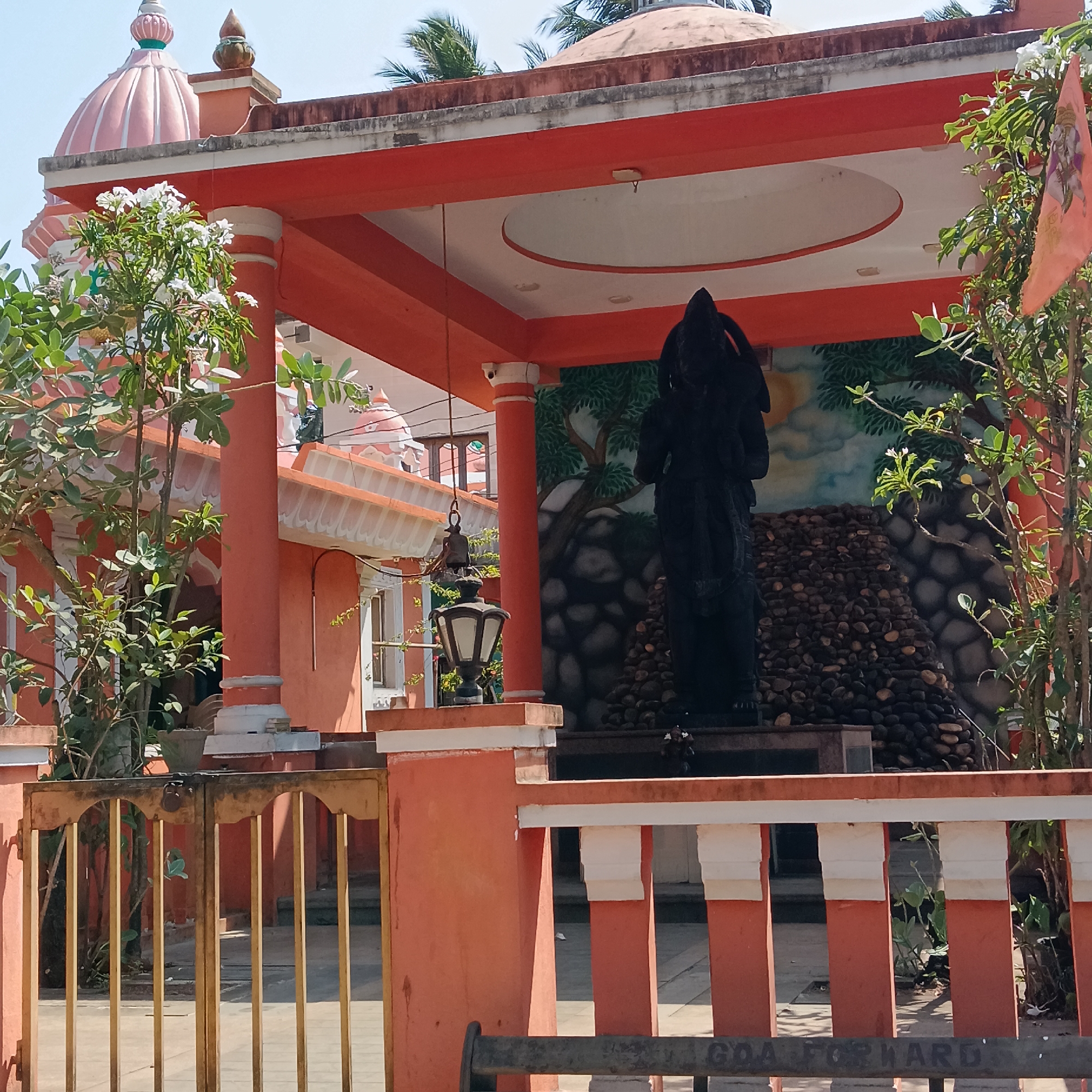 Morning scenes from Goa villages show temples, waterways, strays