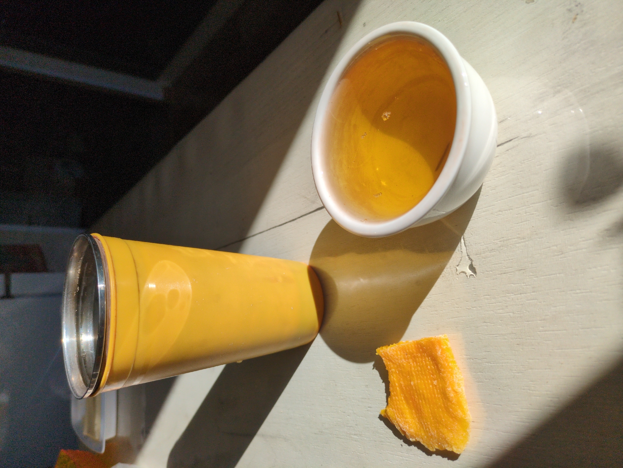 Sunlit table with tea and dried food in Kulebaki