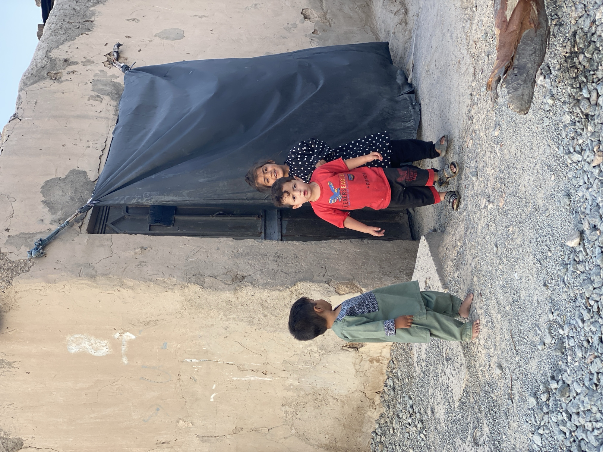 Street life and architecture across a Kandahar neighborhood