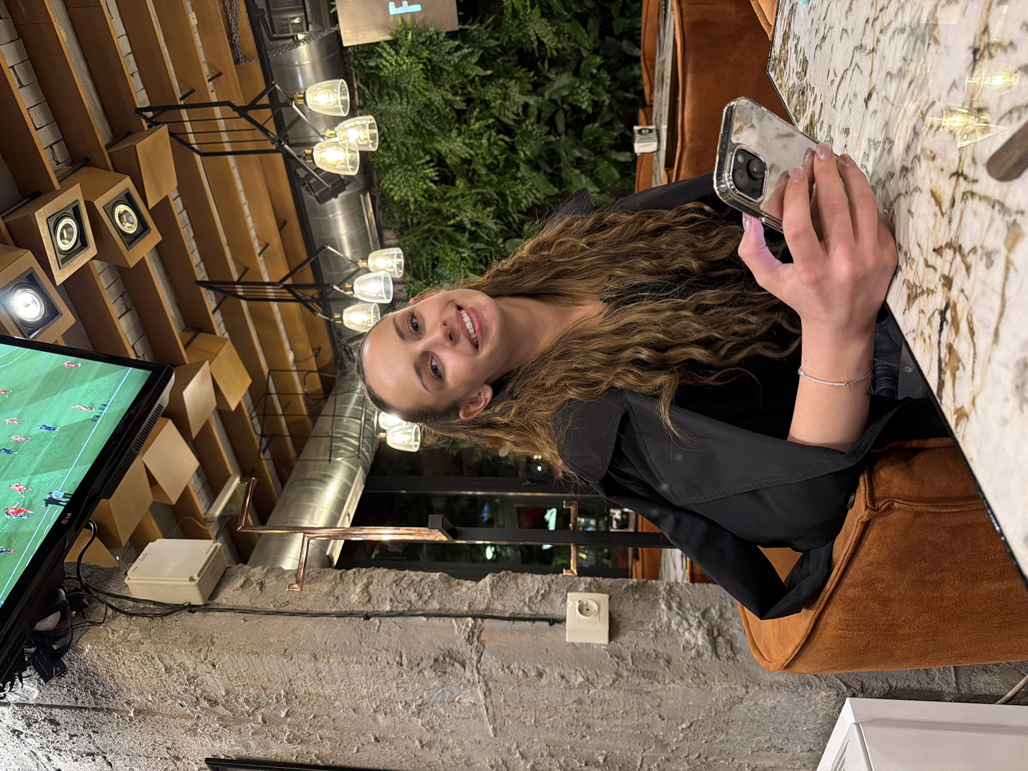 Evening social gathering documented at Sofia cafe-bar establishment