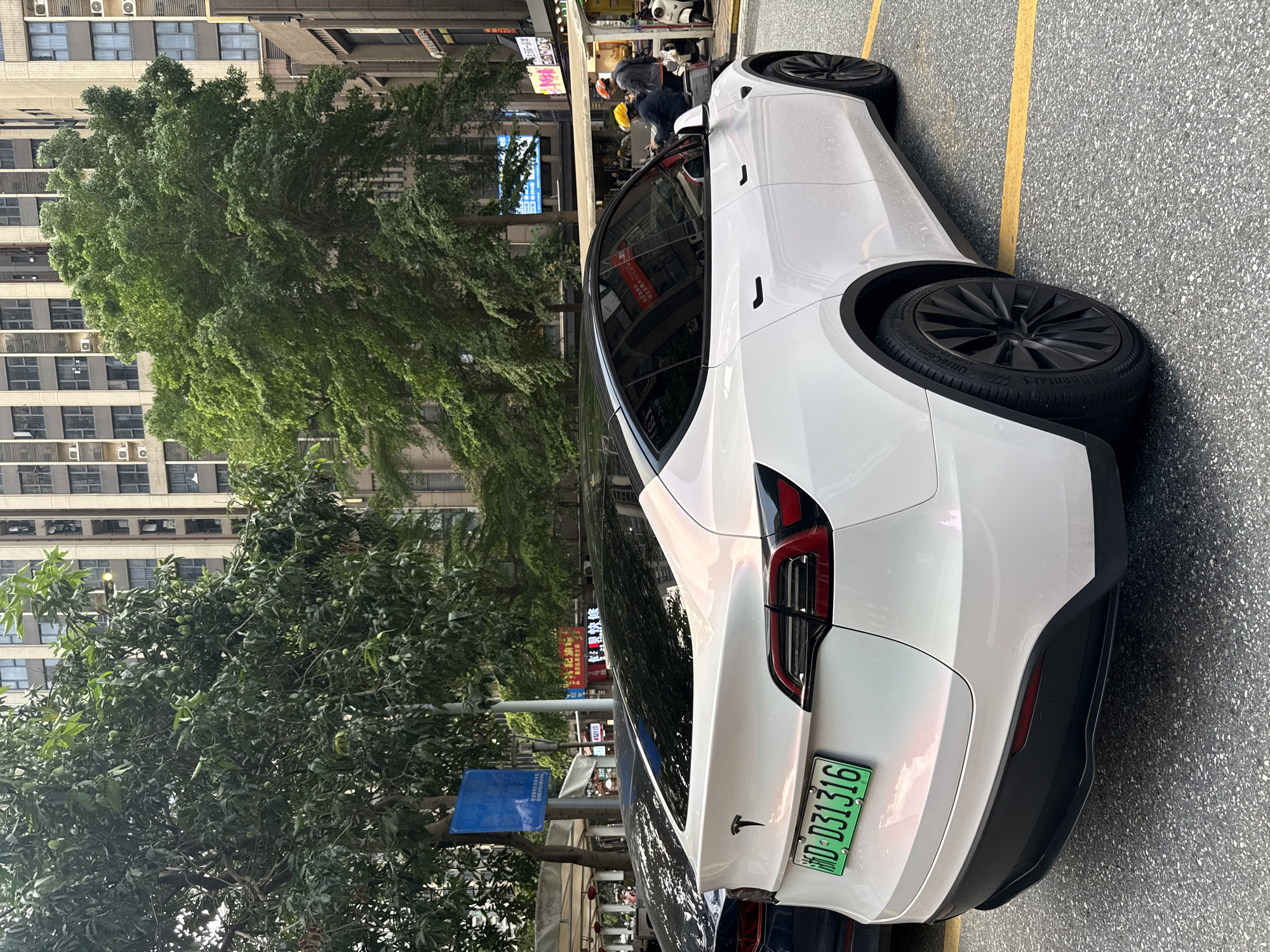 Tesla Model Y parked on Haizhu District street