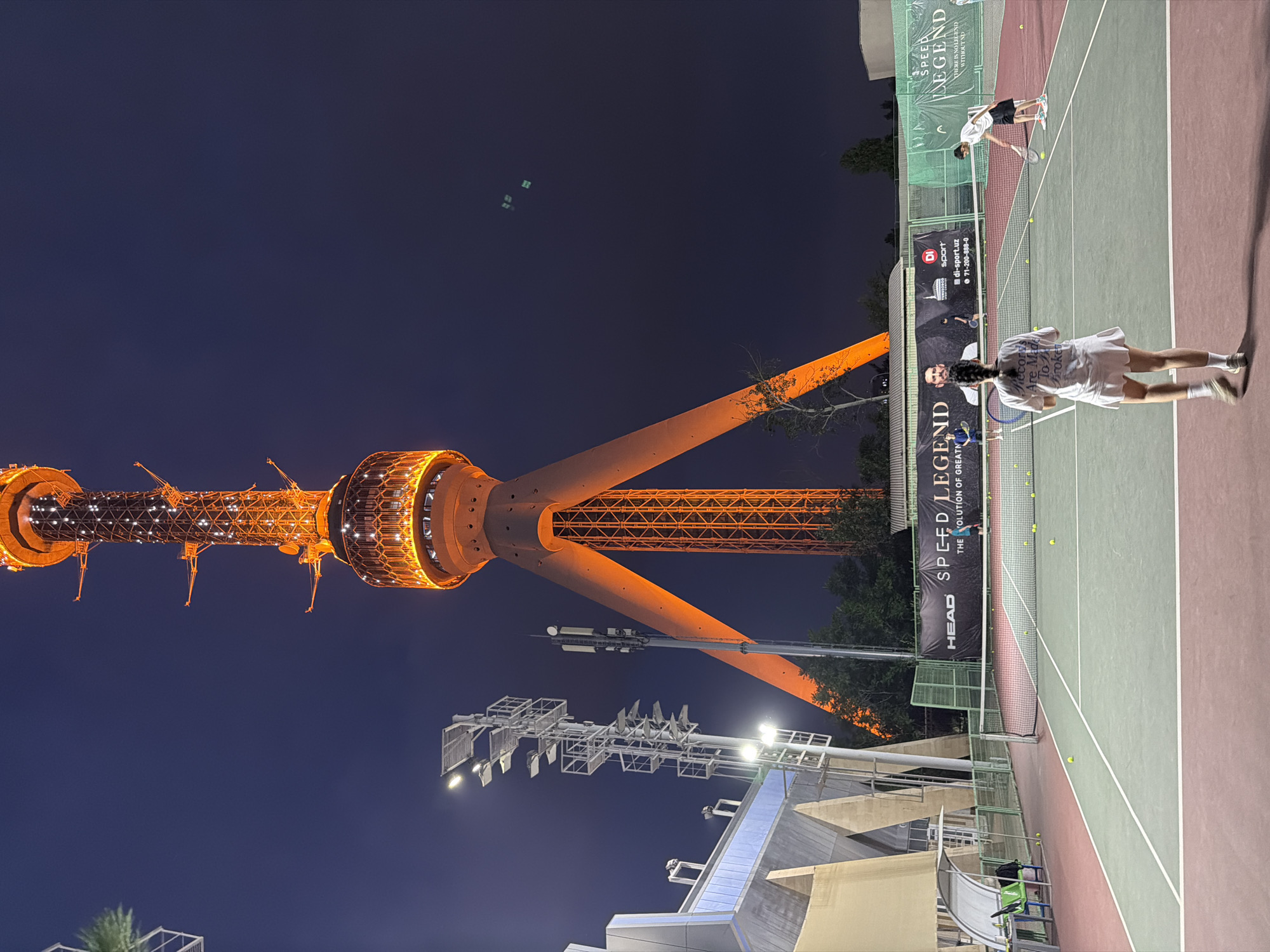 Evening tennis and tower views captured in Tashkent