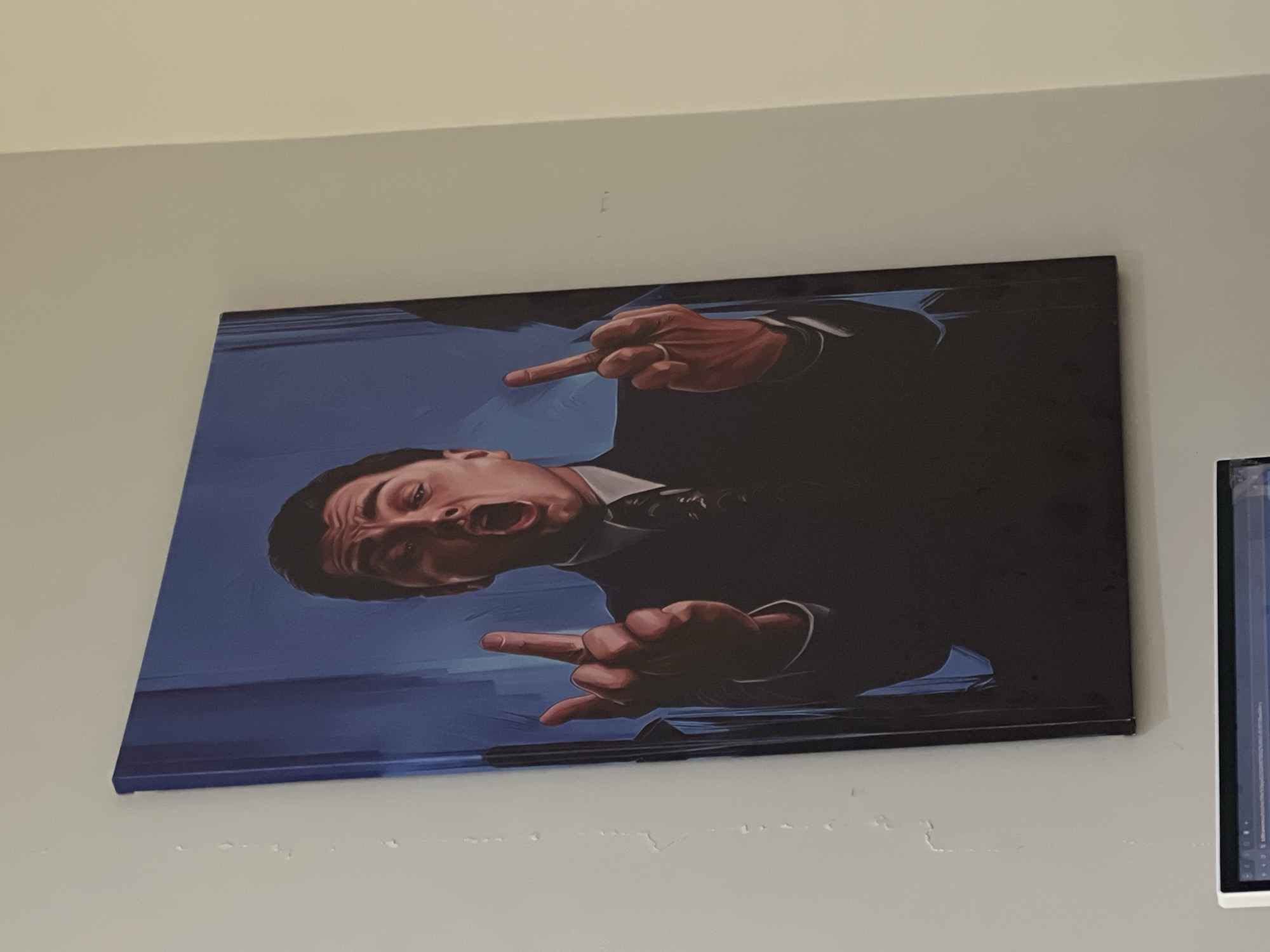 Formal portrait artwork observed on wall in Astana