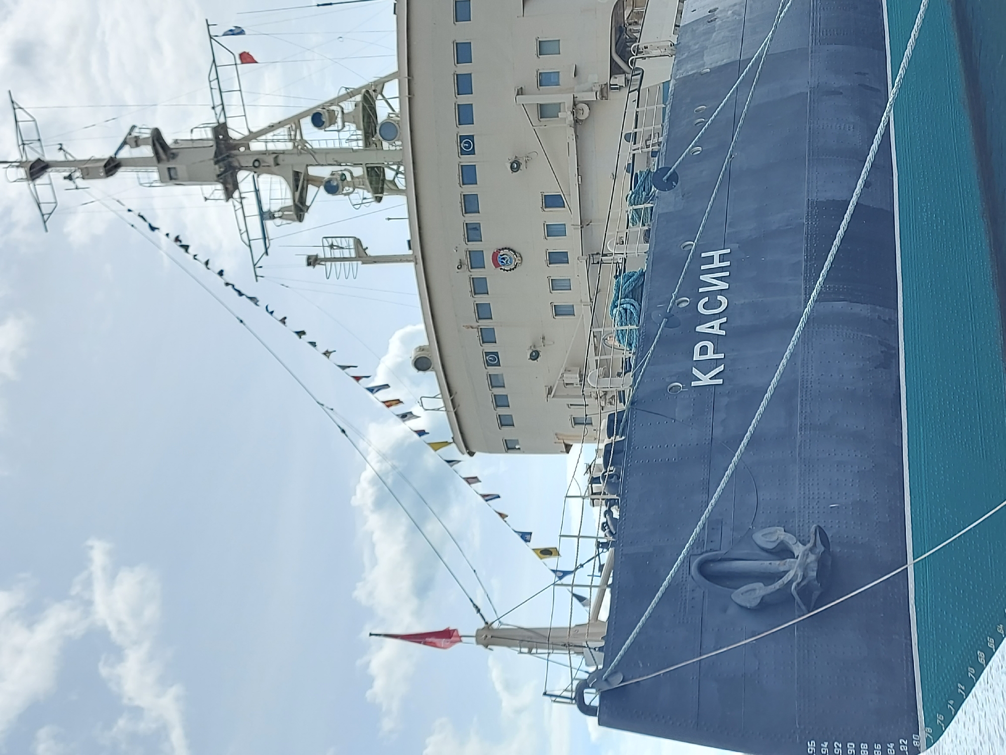 Routine sightseeing moments captured around Saint Petersburg's Krasin museum ship