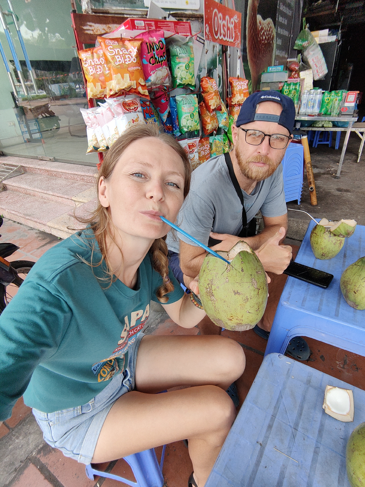 Early morning coconut vendors serve customers in Vietnam ward