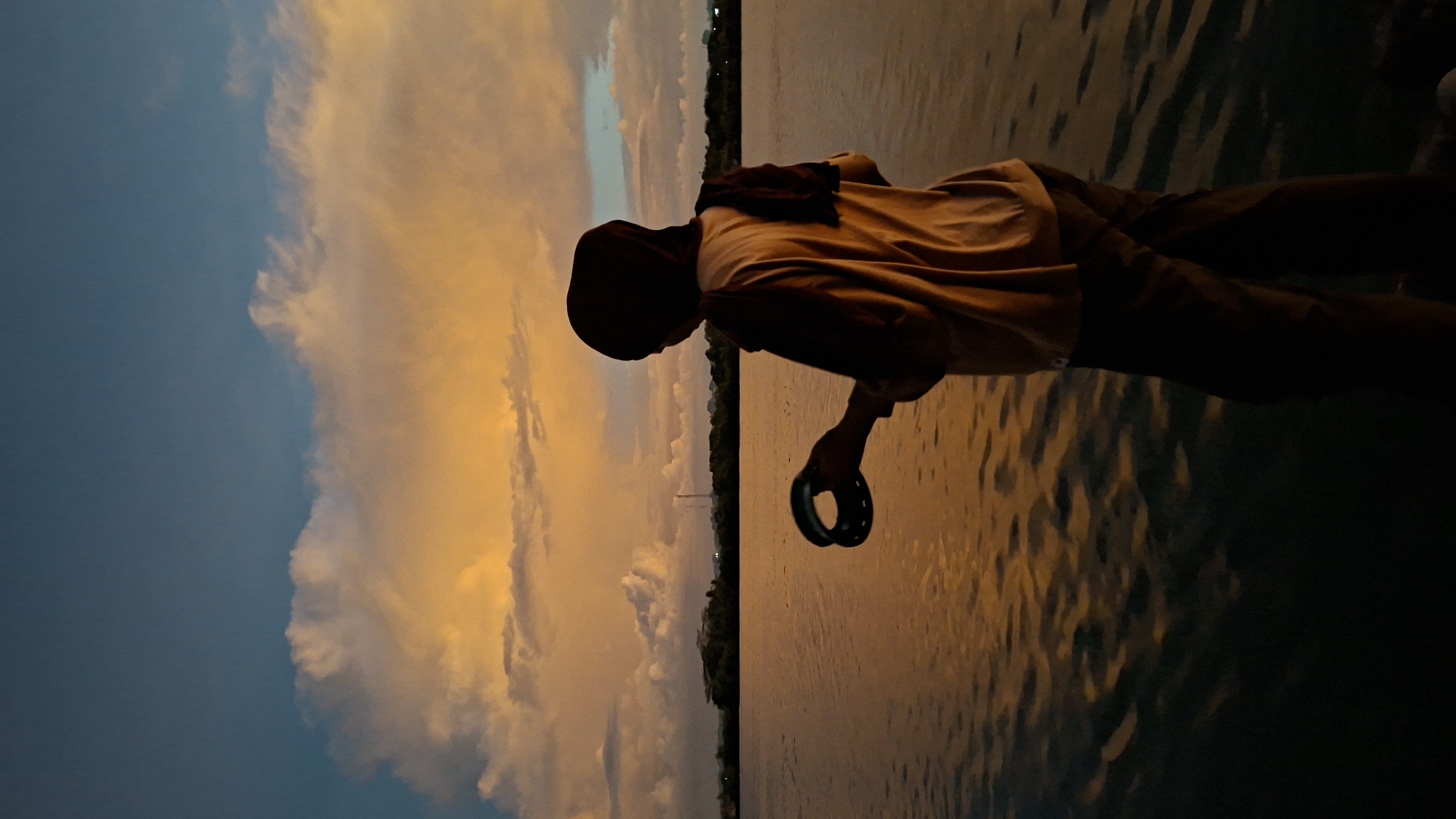 Sunset at the Lhokseumawe waterfront, people taking it in