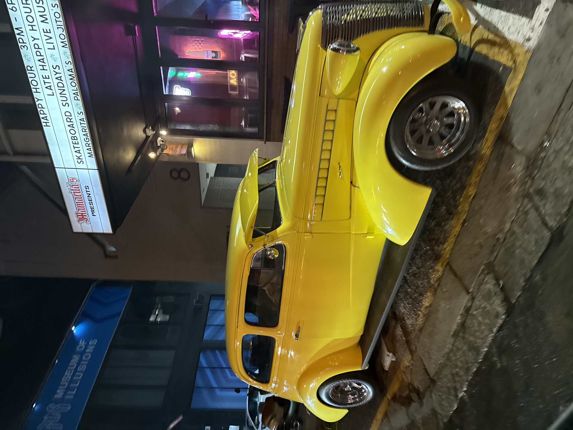 Yellow vintage car spotted on Cape Town street