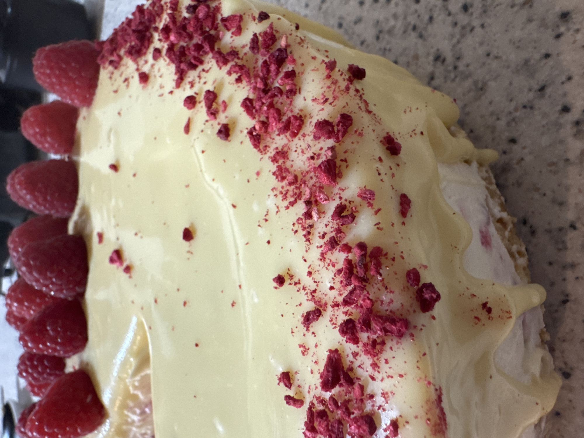 Raspberry cheesecake documented during evening consumption in Desborough