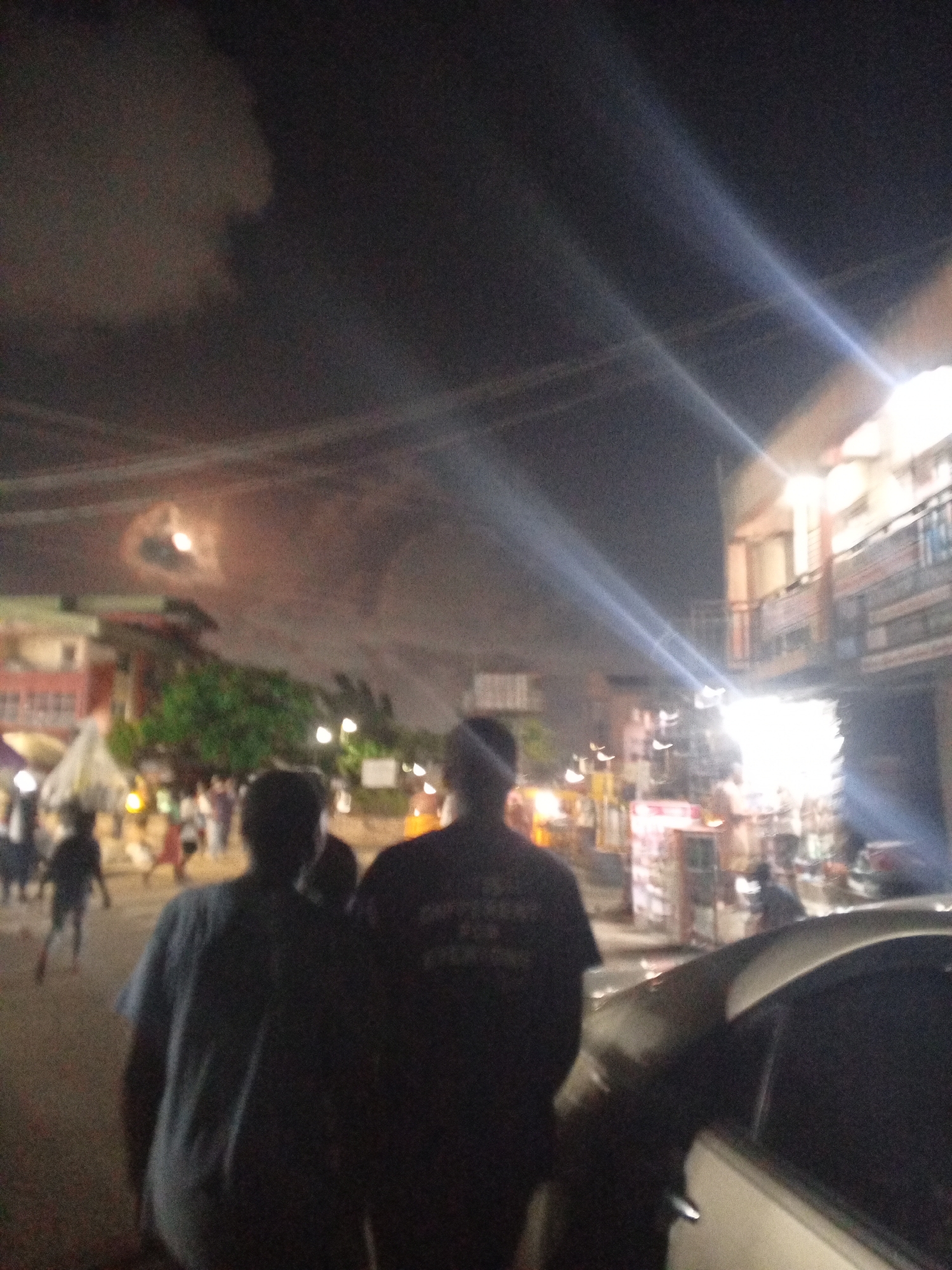 Evening street life documented around Fidelity Bank in Lagos