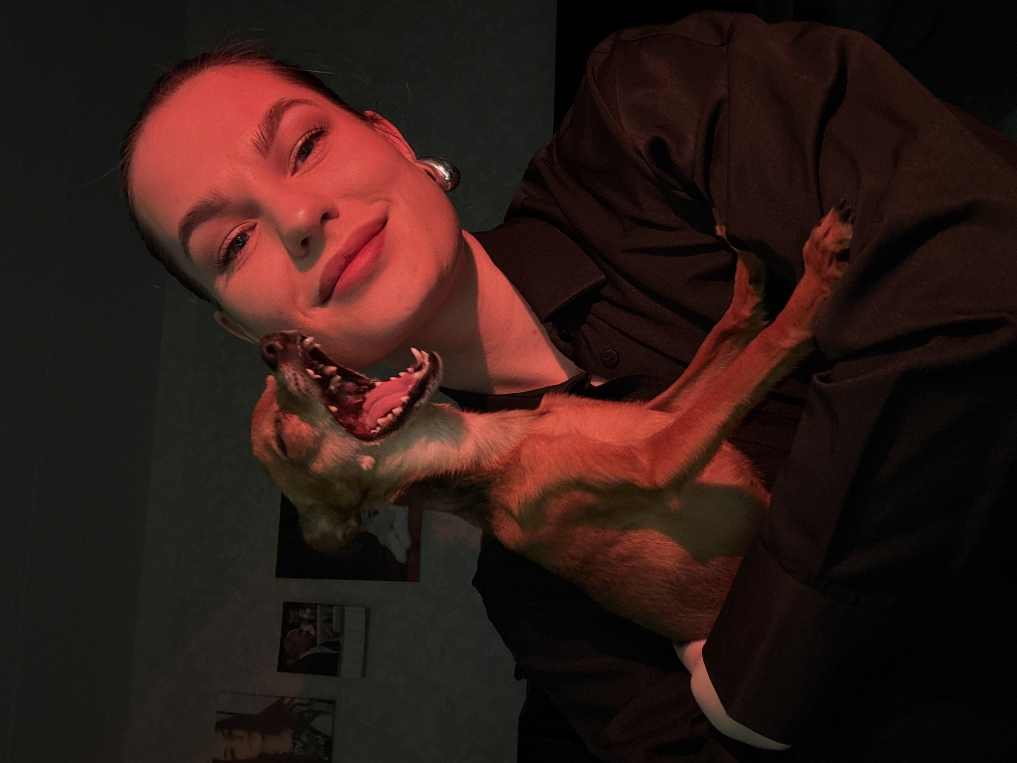 Woman documents evening routine with dog in Chaikovsky, Russia