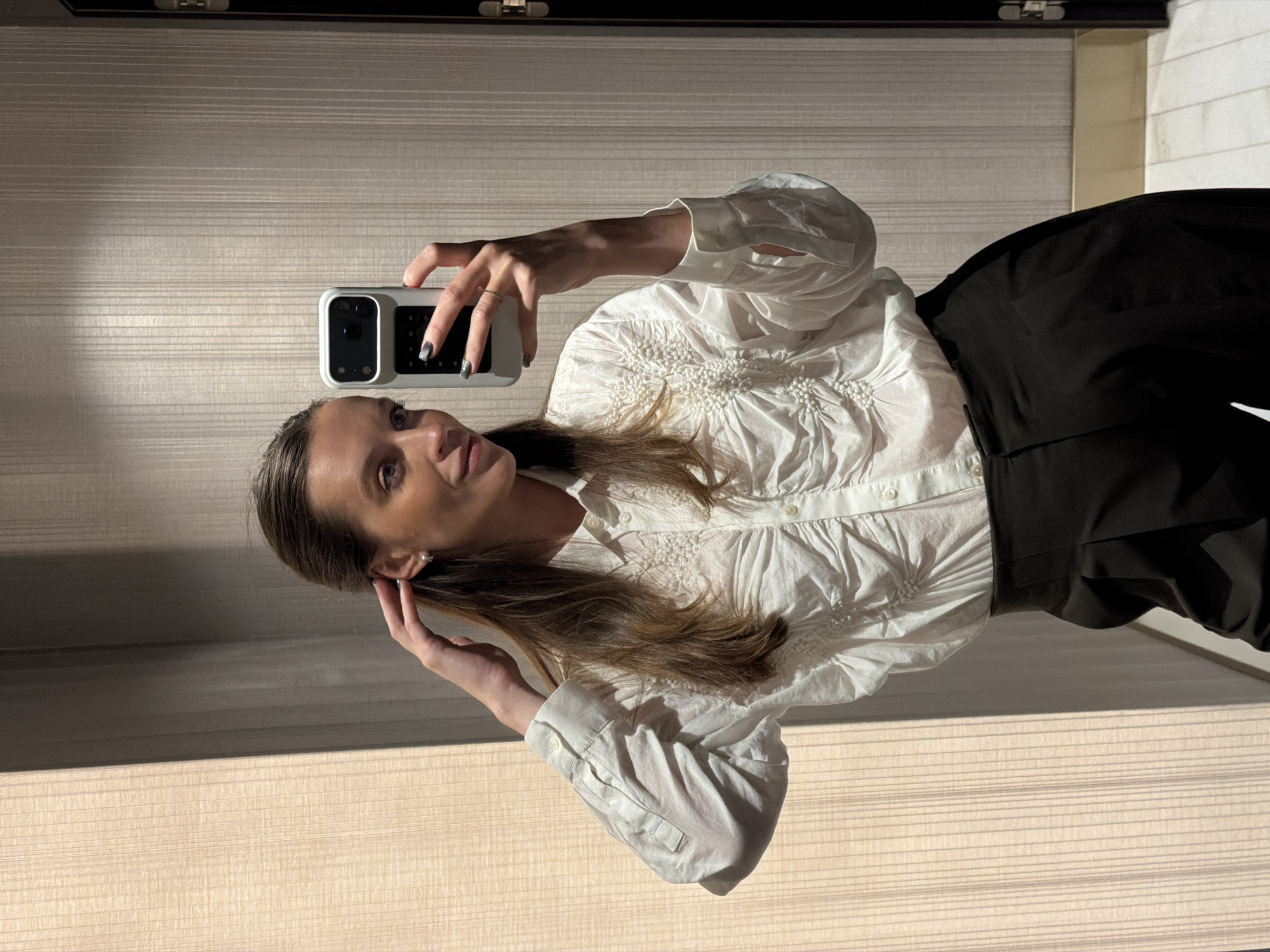 Woman takes indoor selfie in Budva, Montenegro