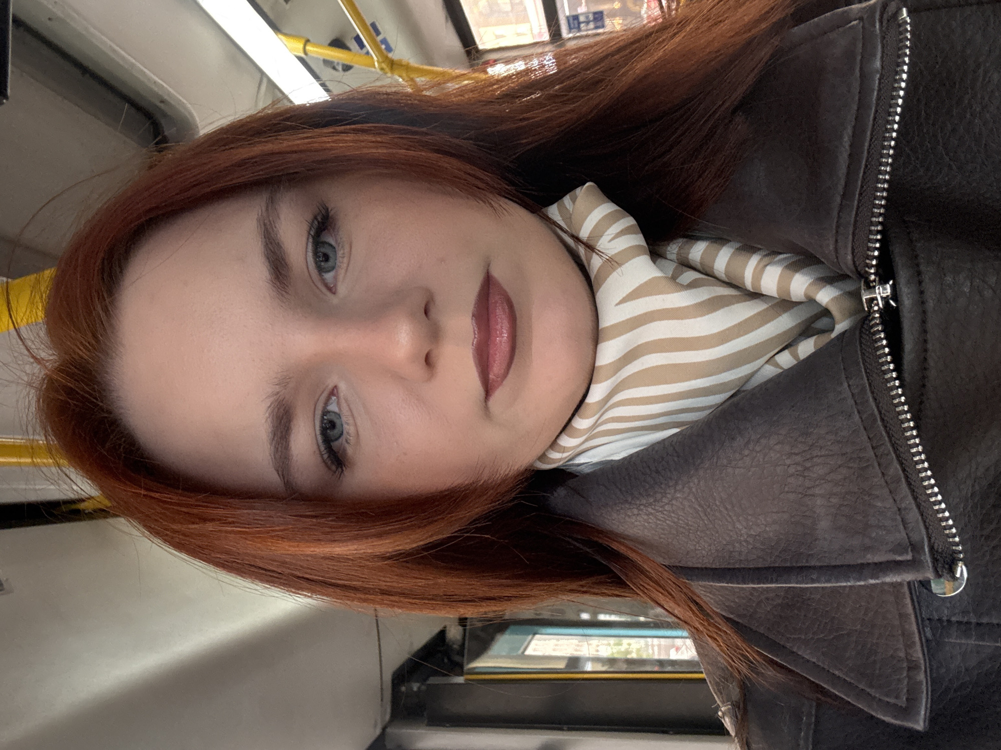 Woman takes early morning selfies on public transport in Russia