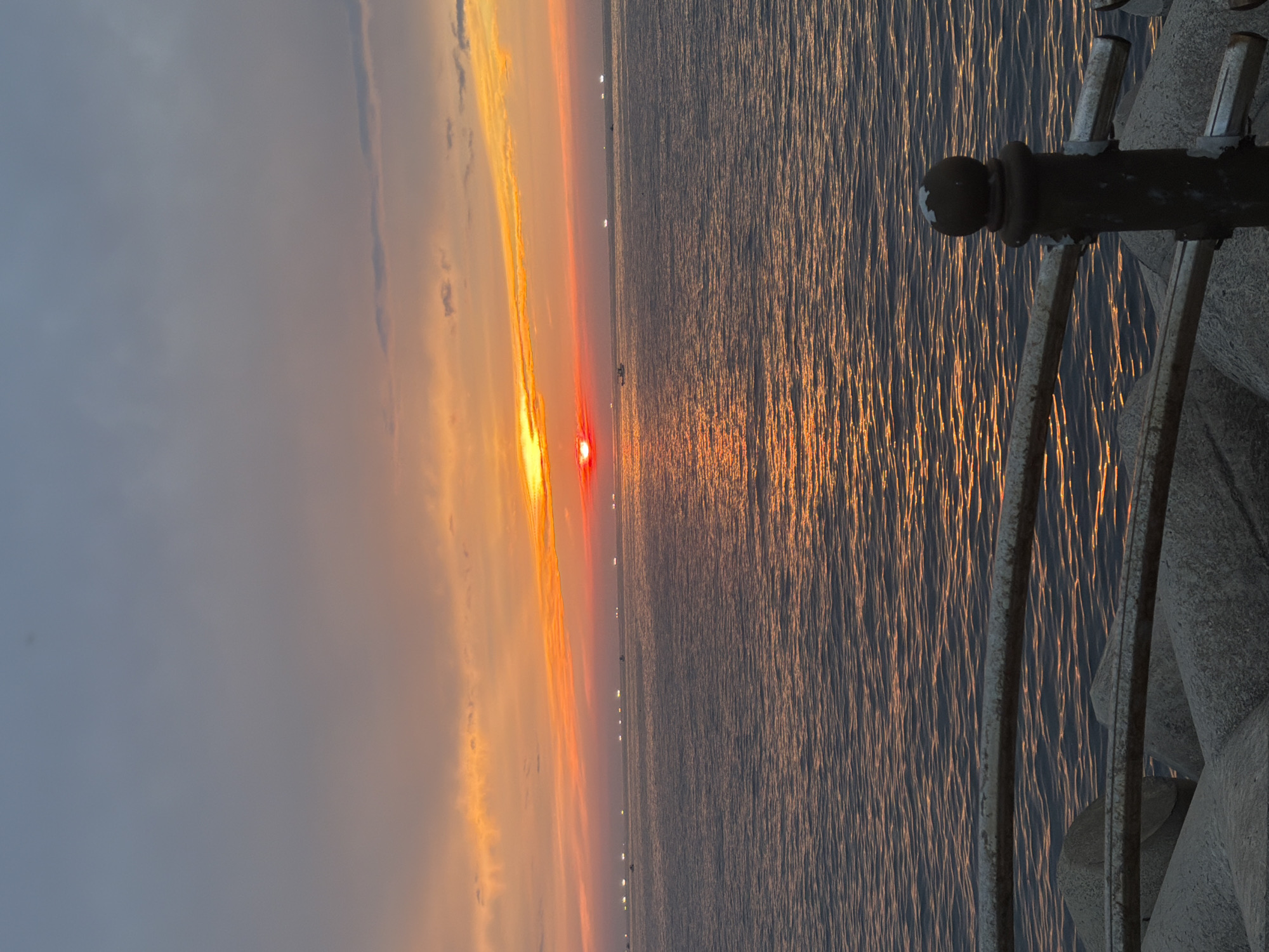 Sunset walk along the Jeju coast, lighthouse to tetrapods