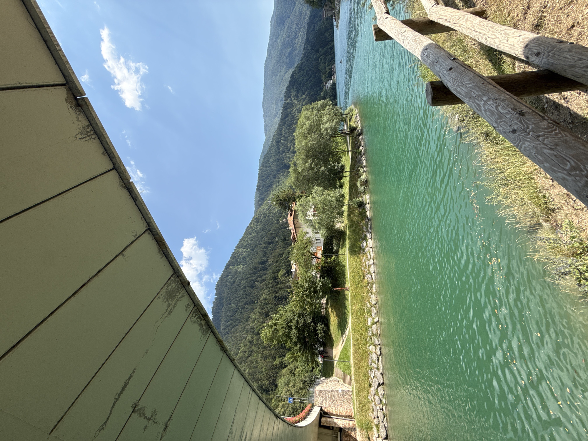 Lazy summer afternoon at turquoise Lake Molveno, Italian Alps