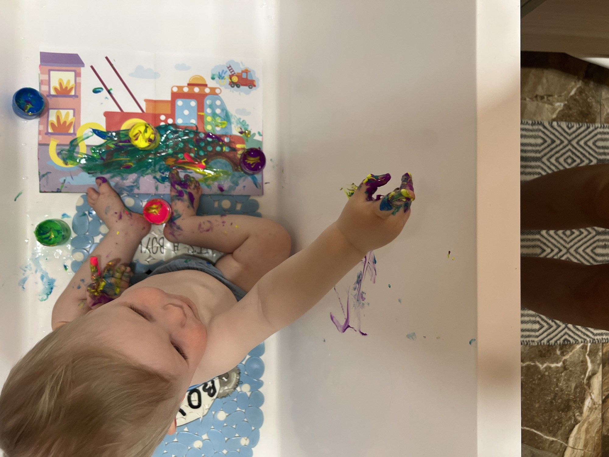 Child's Paint-Covered Art Session Captured in Khimki Bathroom