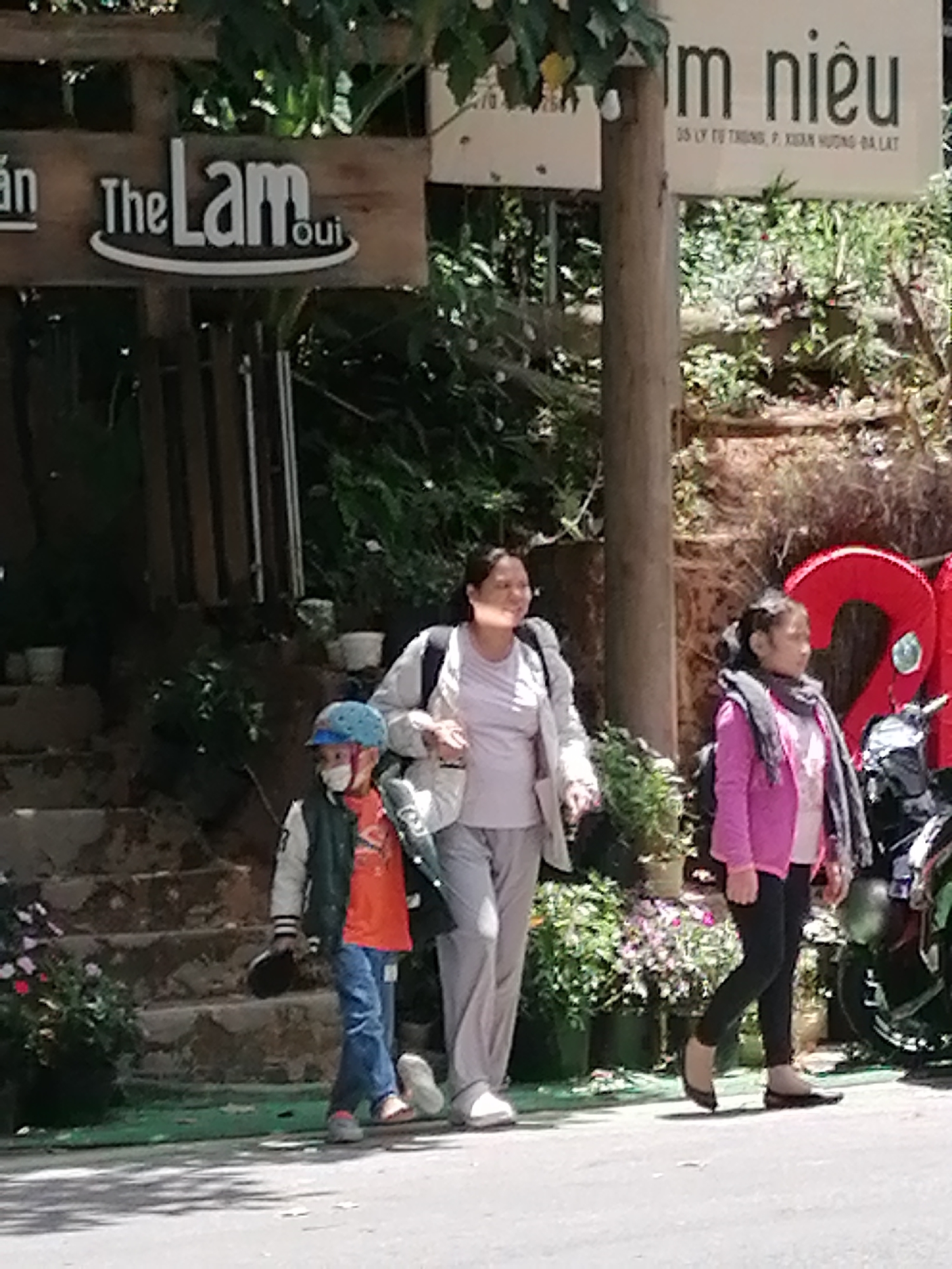 Morning around Da Lat's Don Bosco school: statues, art, and café life