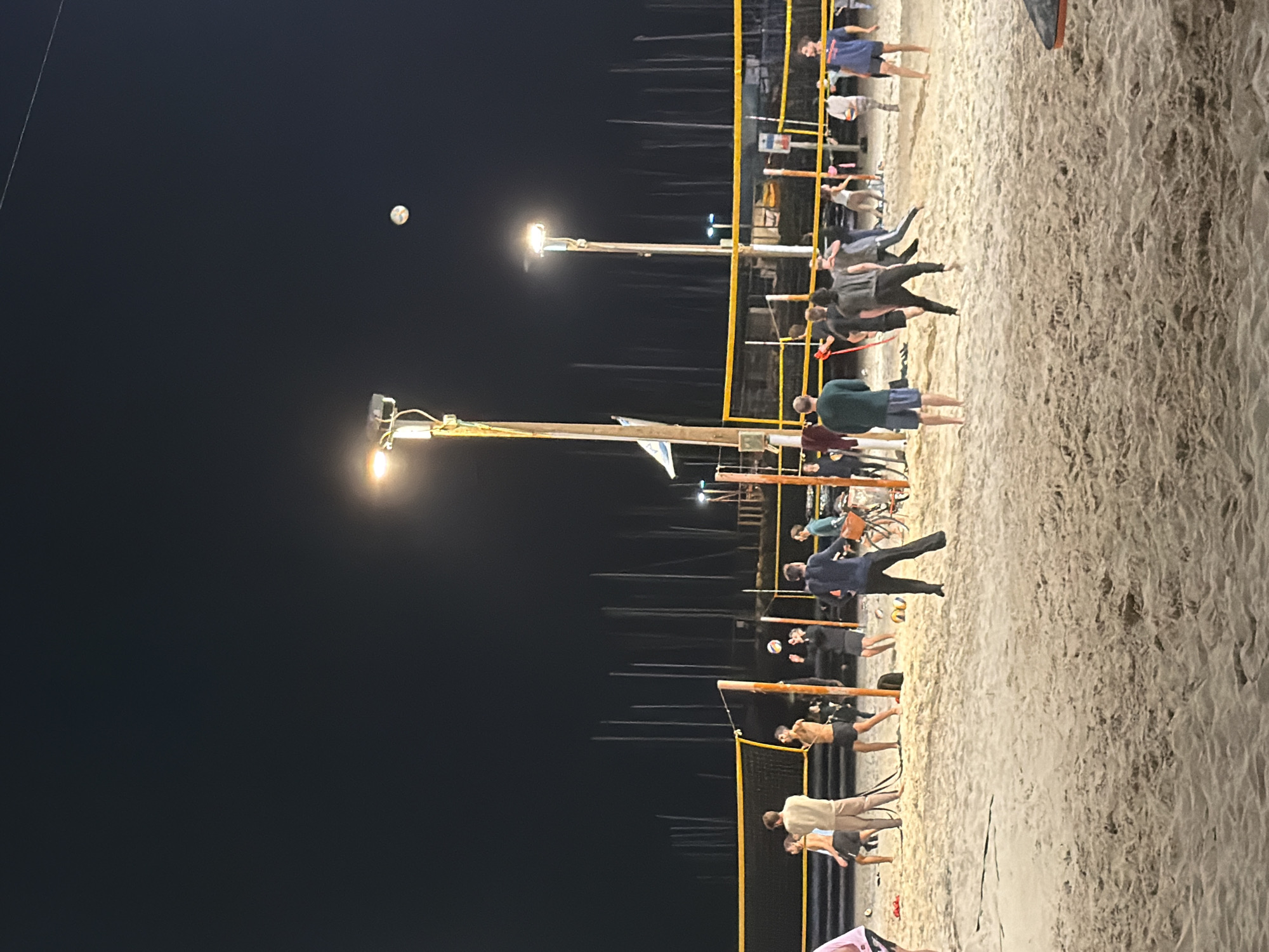 Nighttime beach volleyball games draw crowds in Tel Aviv