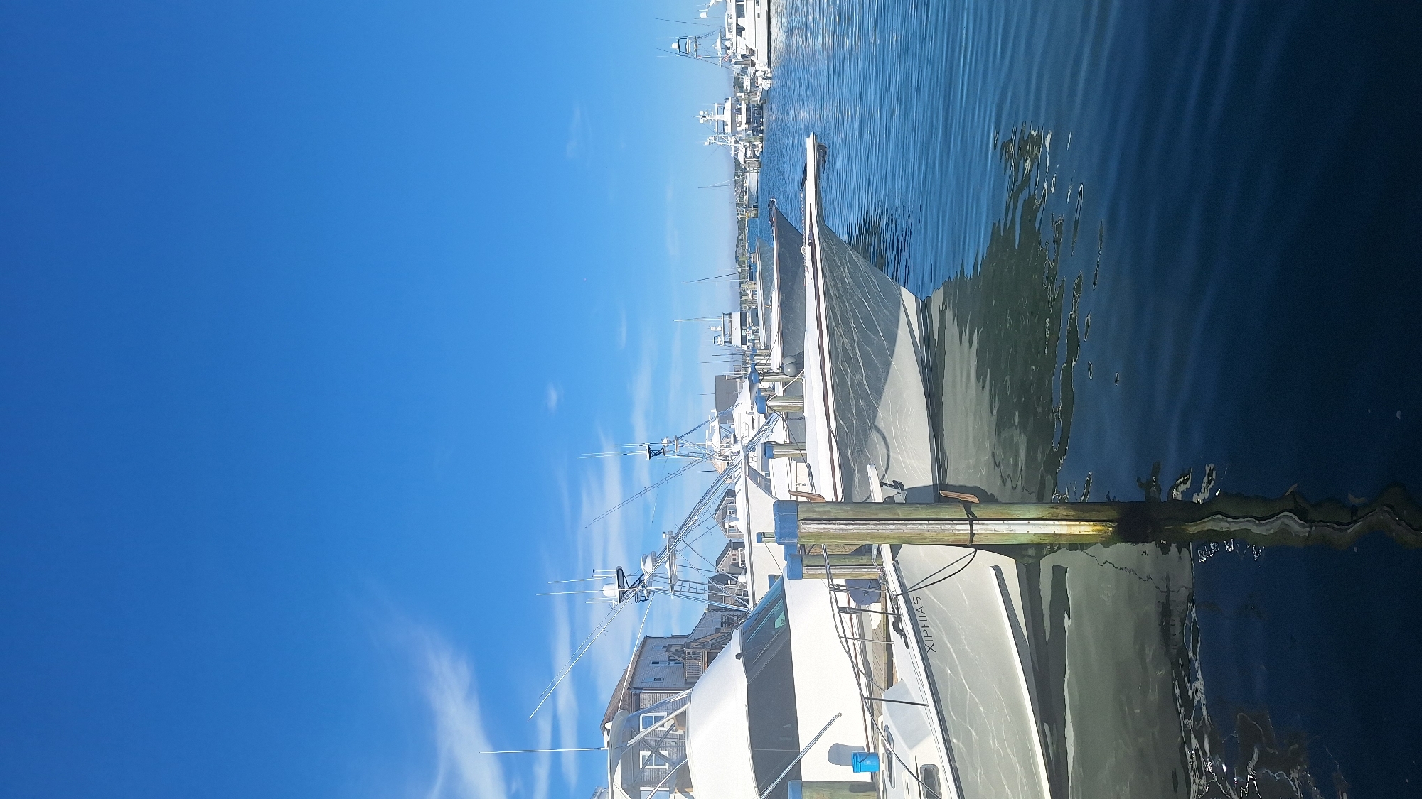 Boats docked on a sunny afternoon at Nantucket Harbor