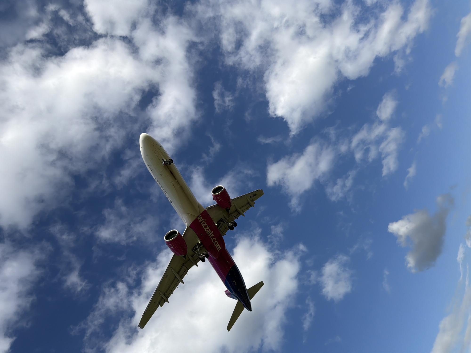 Wizz Air aircraft approaches Sofia with landing gear extended