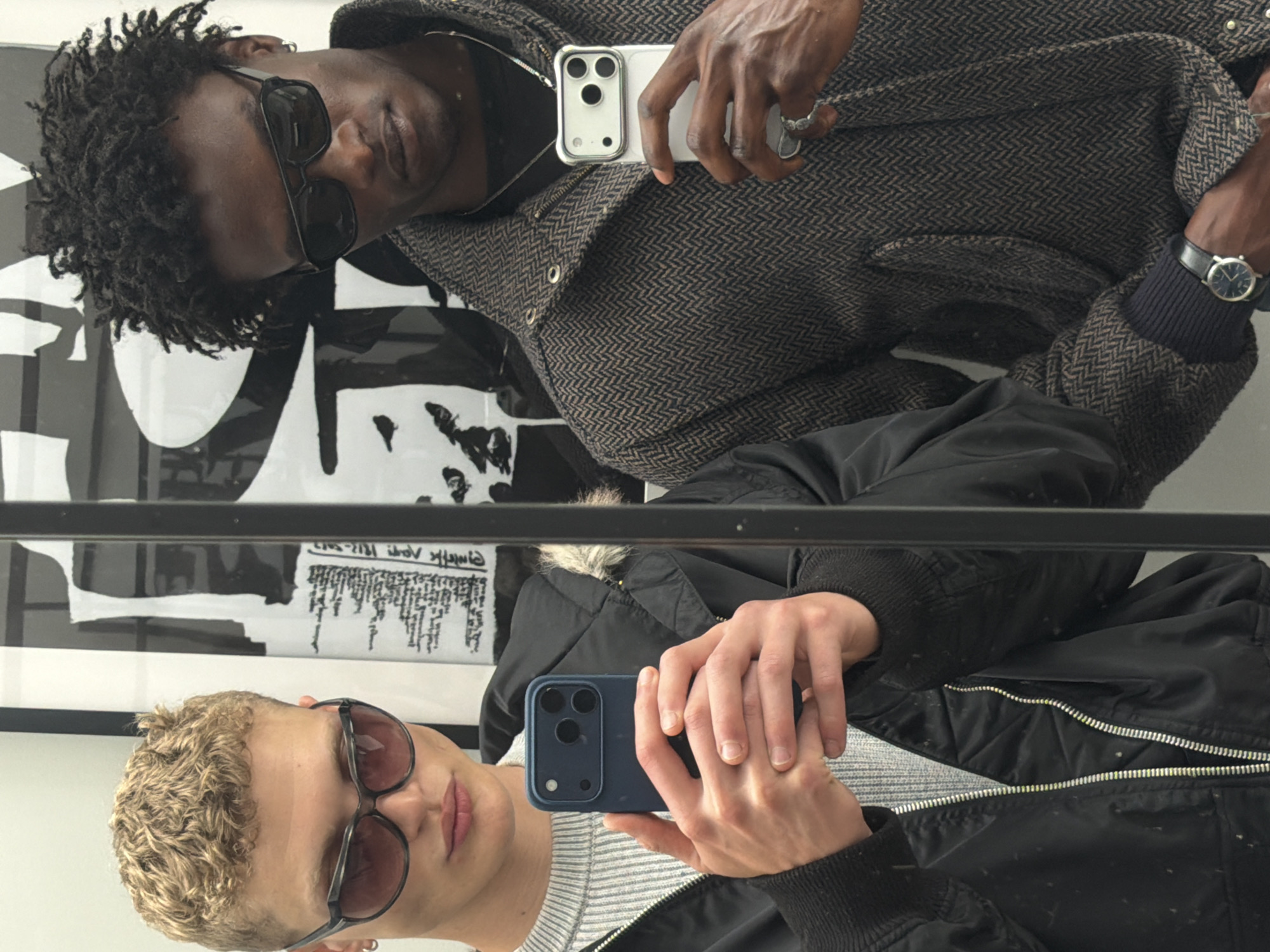 Two men take mirror selfies across London locations