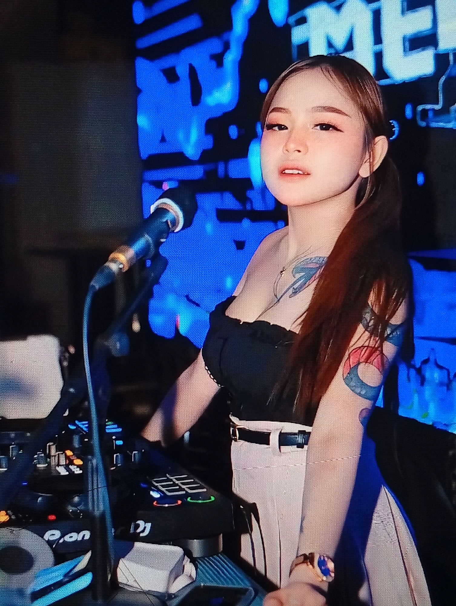Nightclub entertainment scene in Lhokseumawe with DJs and performers
