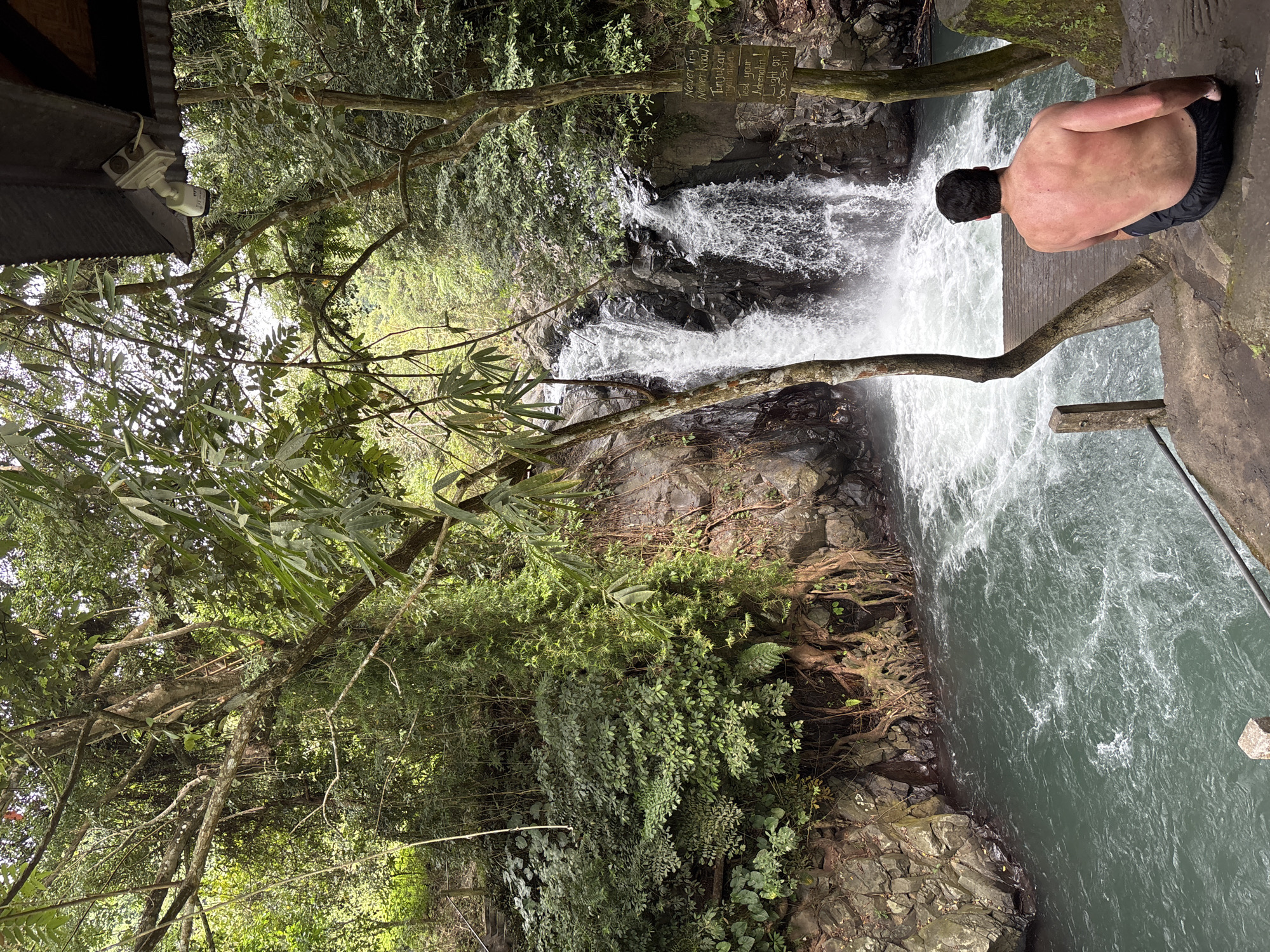 Morning waterfall recreation activity captured in Sukasada Indonesia