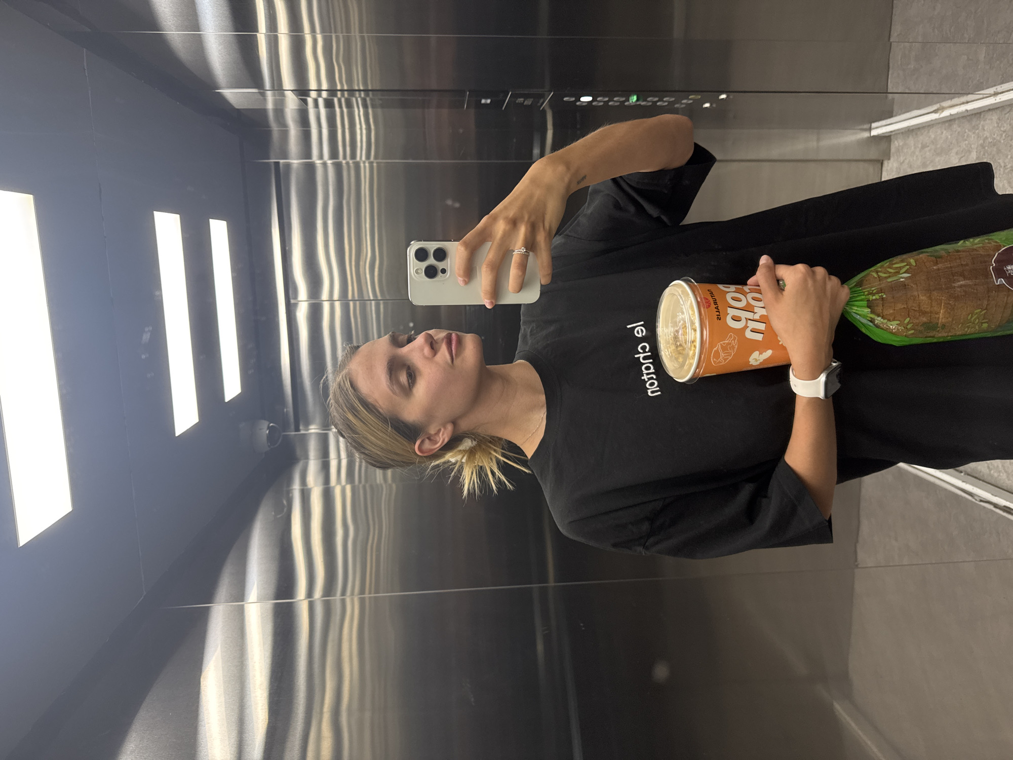 Woman Takes Elevator Selfie; Drawings Found on Ceiling Panel