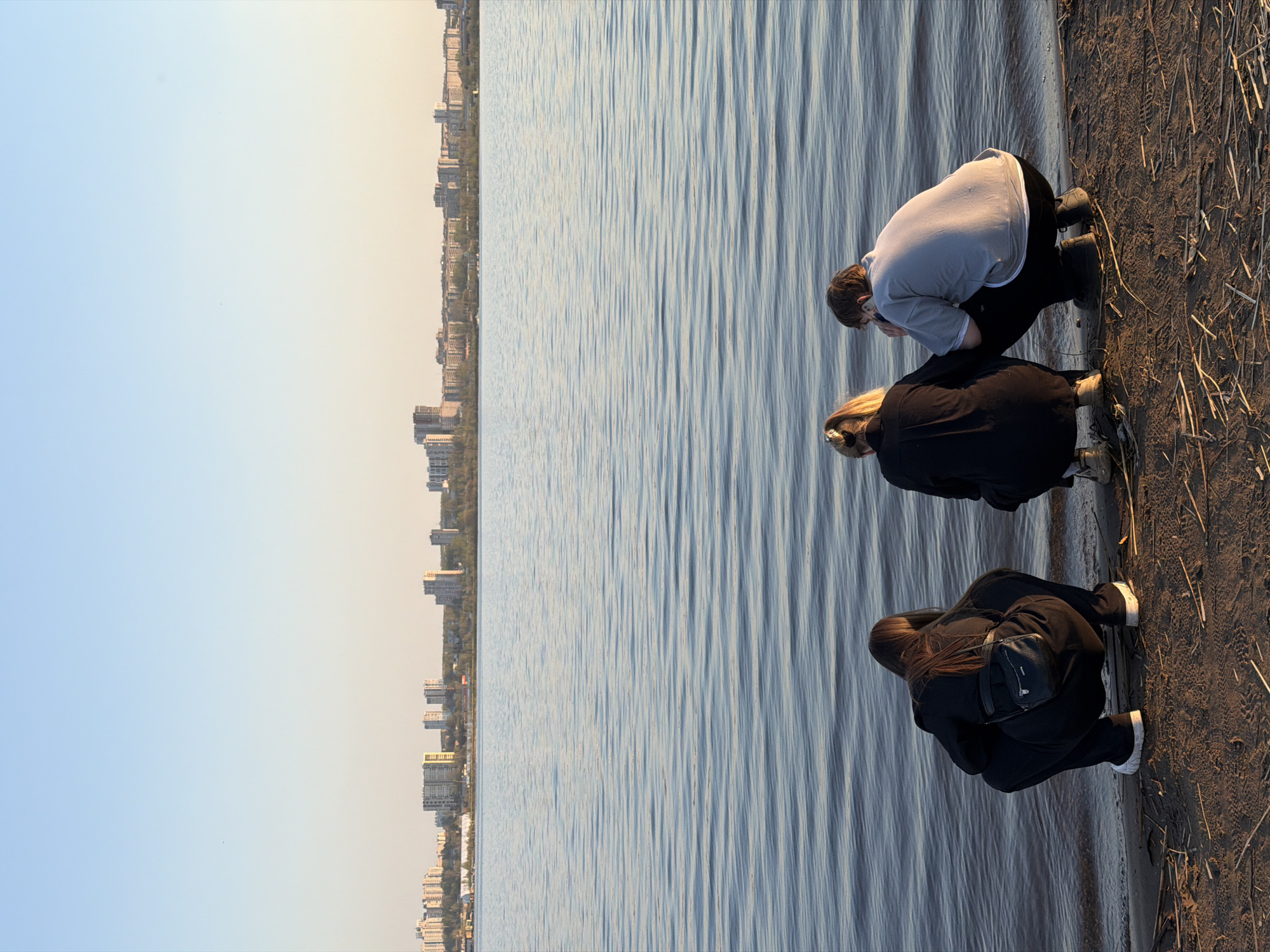 Friends gather for photos along Izhevsk waterfront